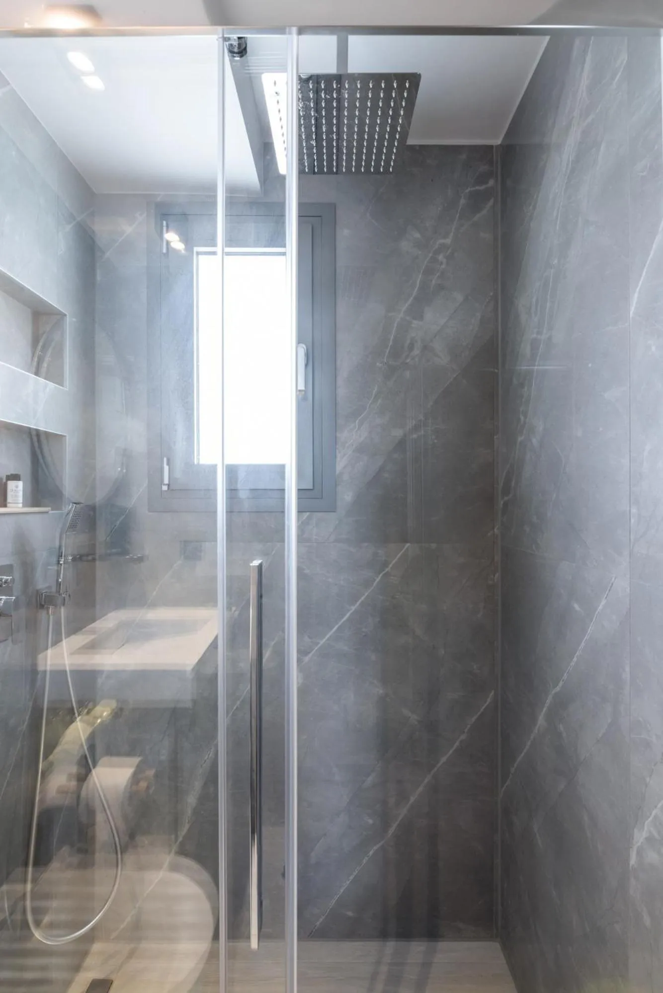 Shower in Amalthia Luxury Suites