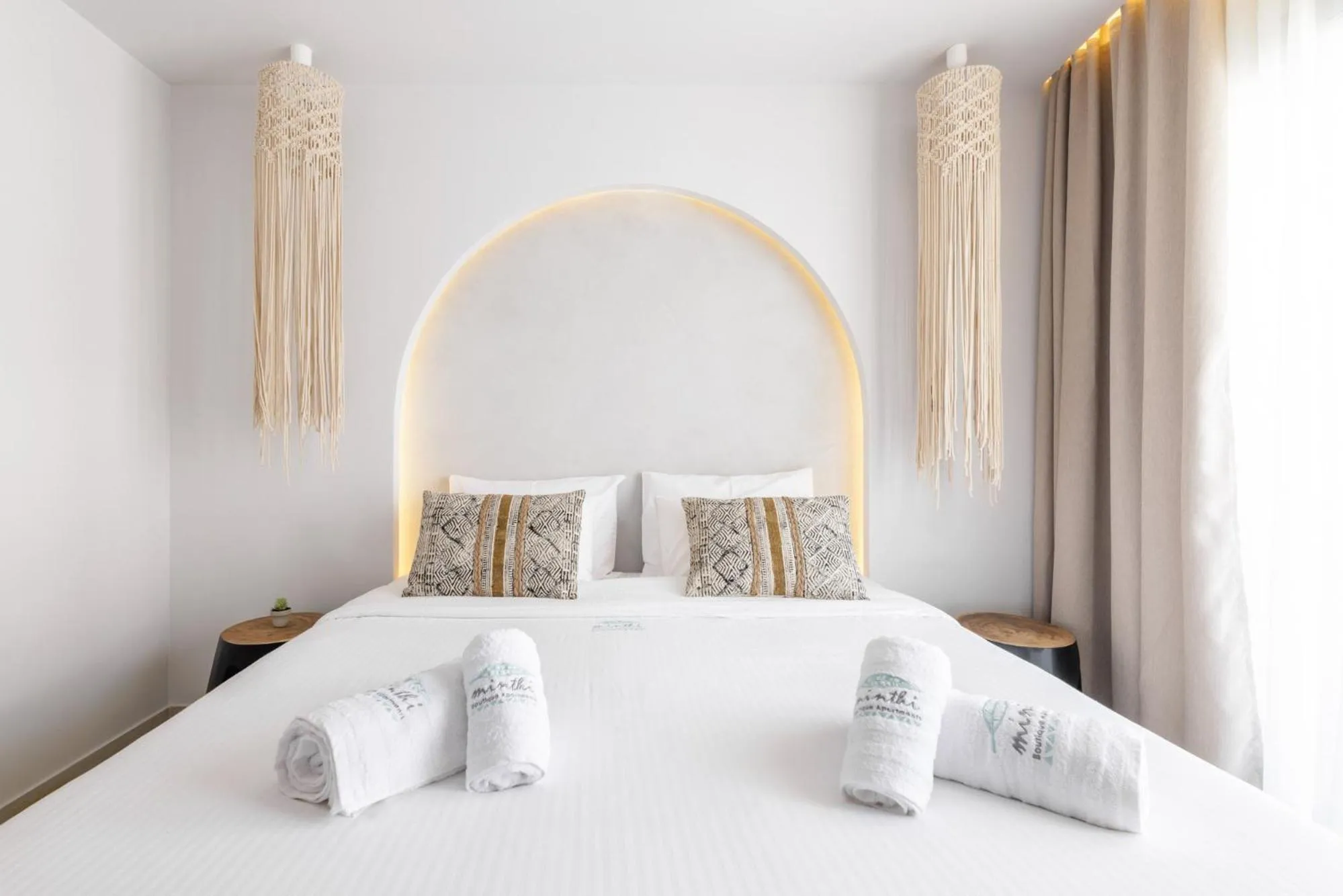 Bed in Amalthia Luxury Suites