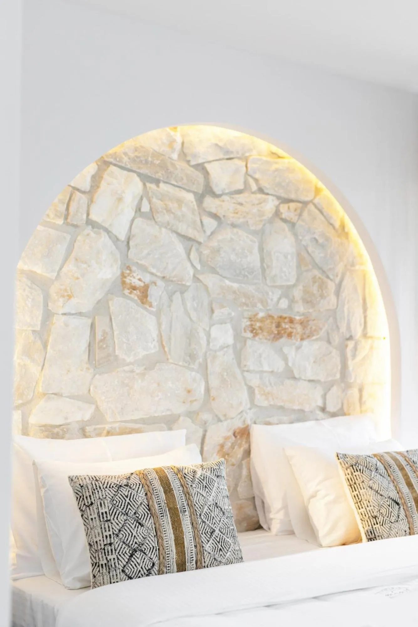 Bed in Amalthia Luxury Suites