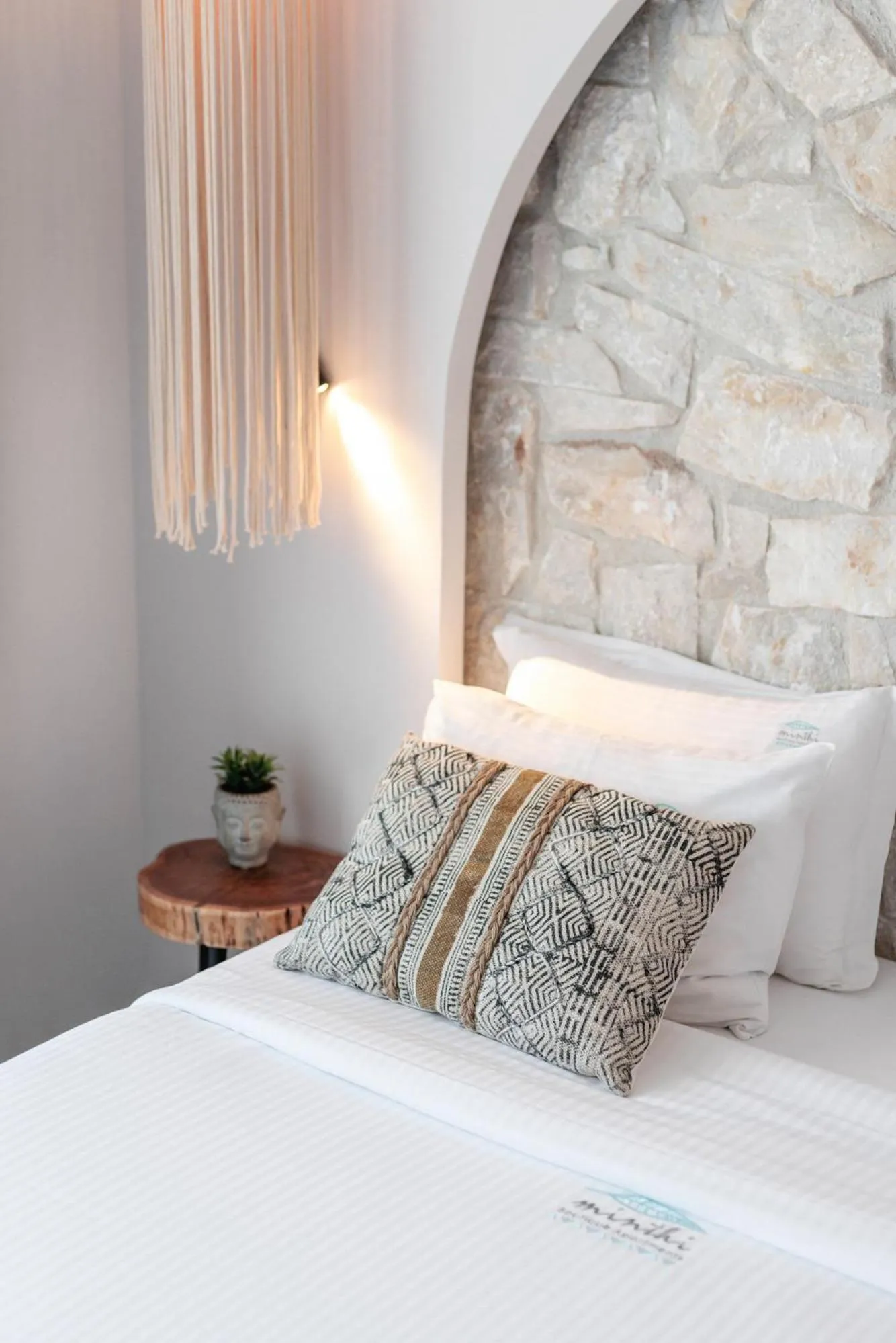 Bed in Amalthia Luxury Suites