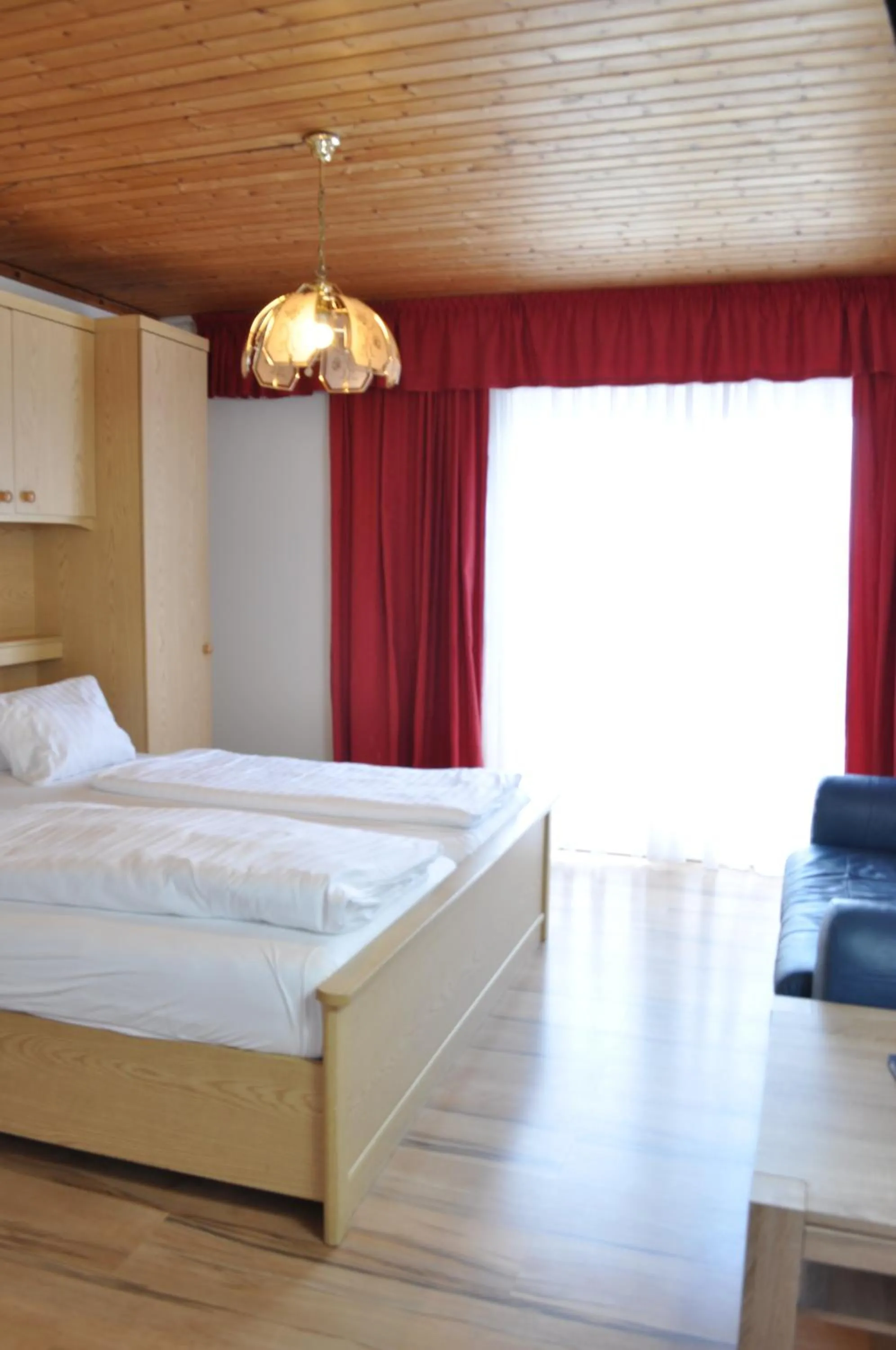 Photo of the whole room, Bed in Gästehaus Herlinde