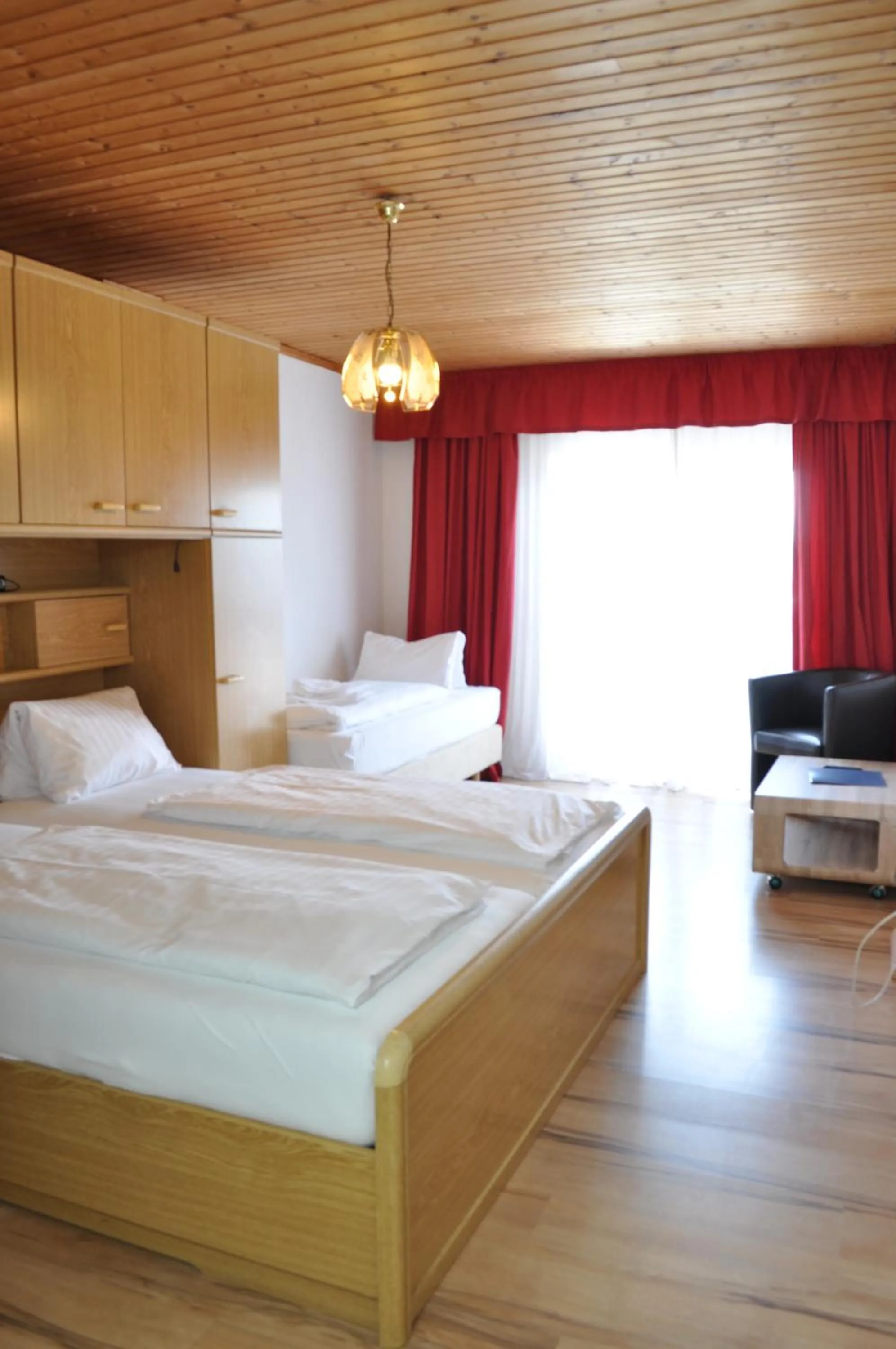 Photo of the whole room, Bed in Gästehaus Herlinde