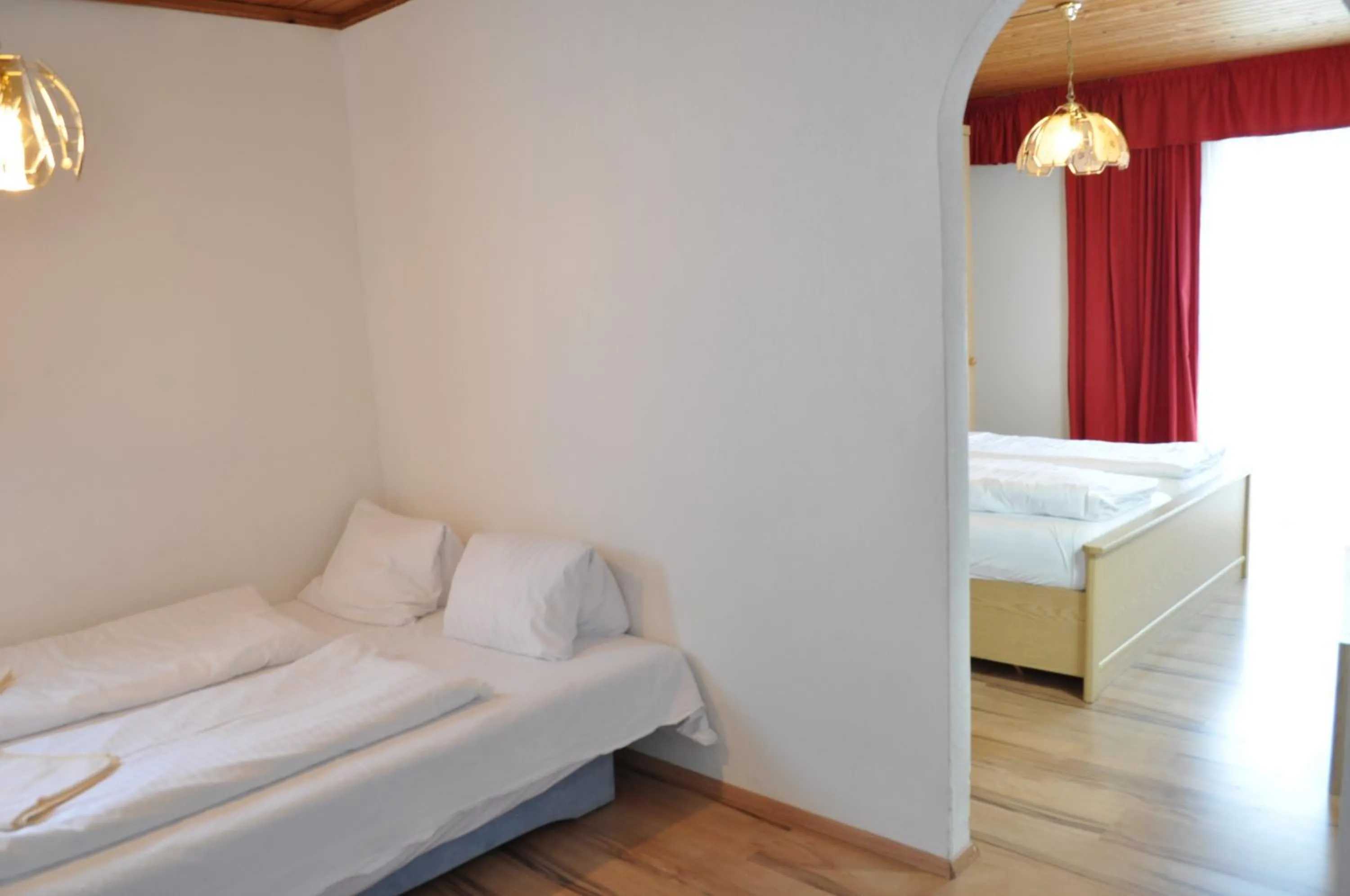 Photo of the whole room, Bed in Gästehaus Herlinde