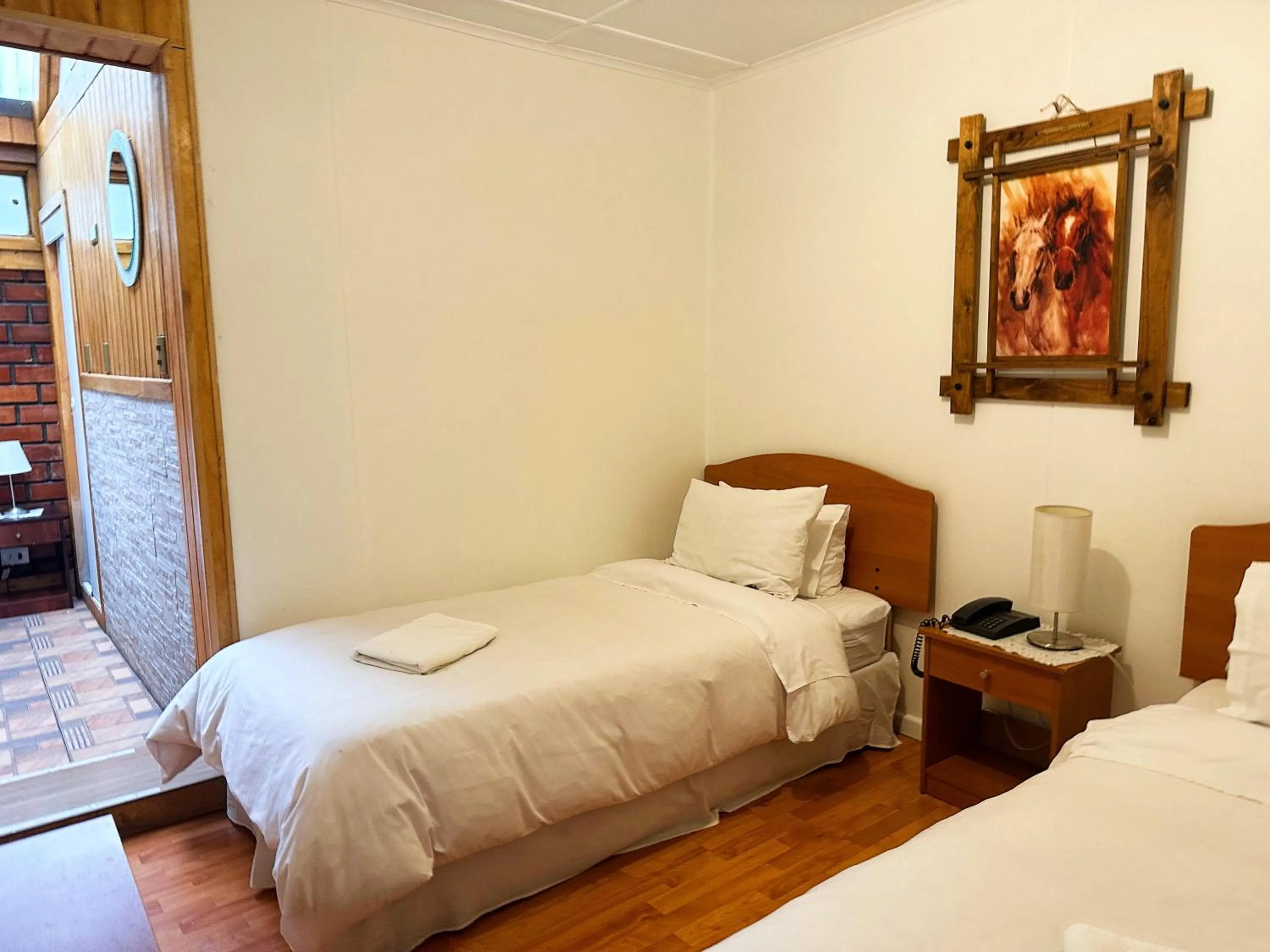 Bed in Hostal Hielo Sur