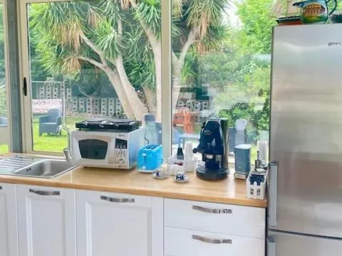 Kitchen or kitchenette in B&B Sunset da carla