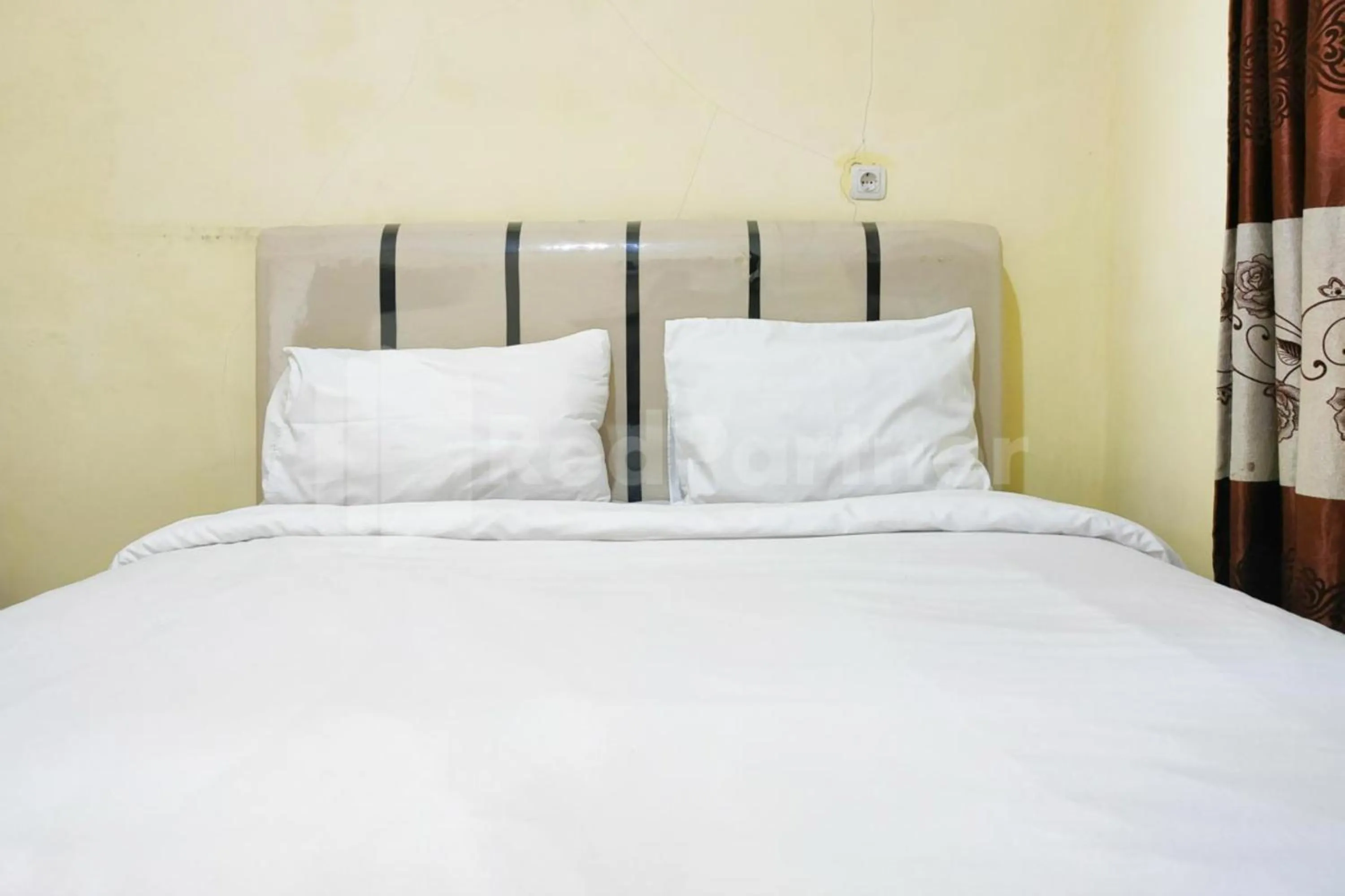 Bed in Ambarita Seaview RedPartner