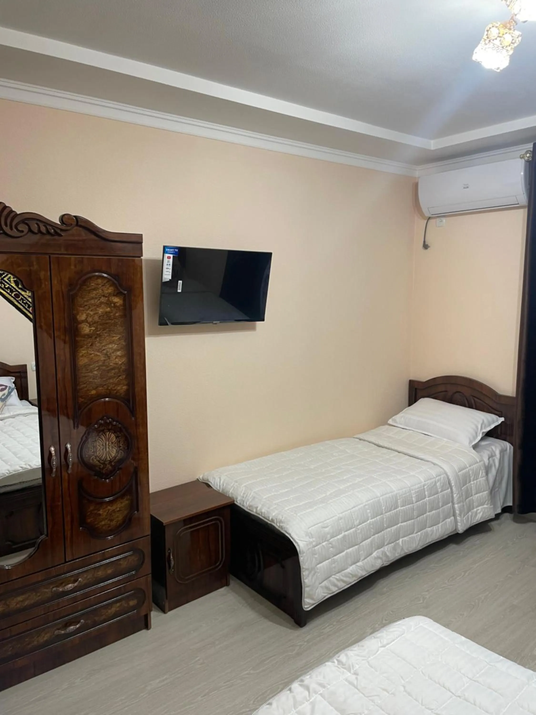 Bed in Hotel Samarkand Ali