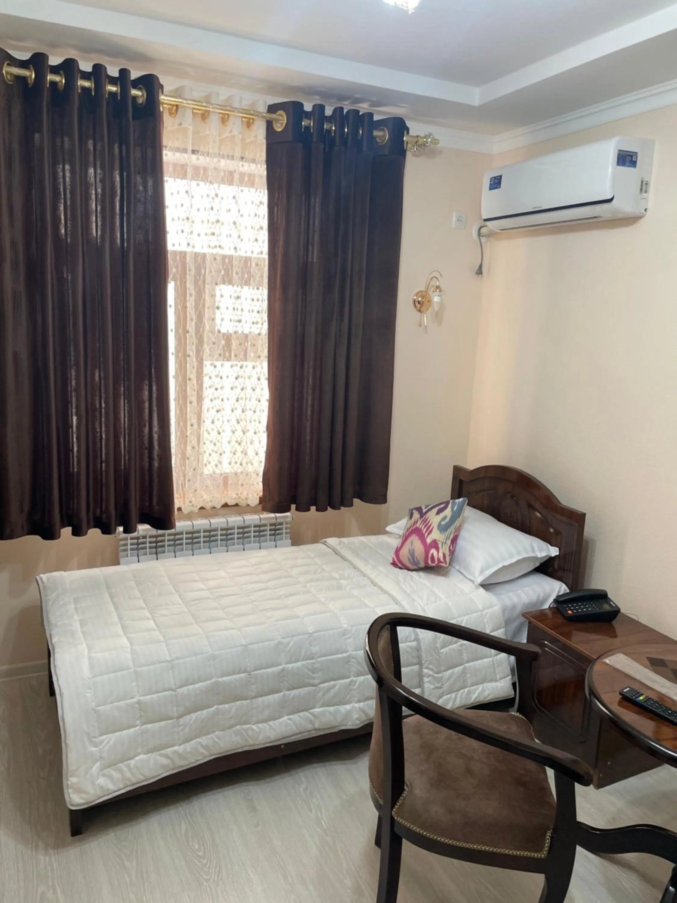 Bed in Hotel Samarkand Ali