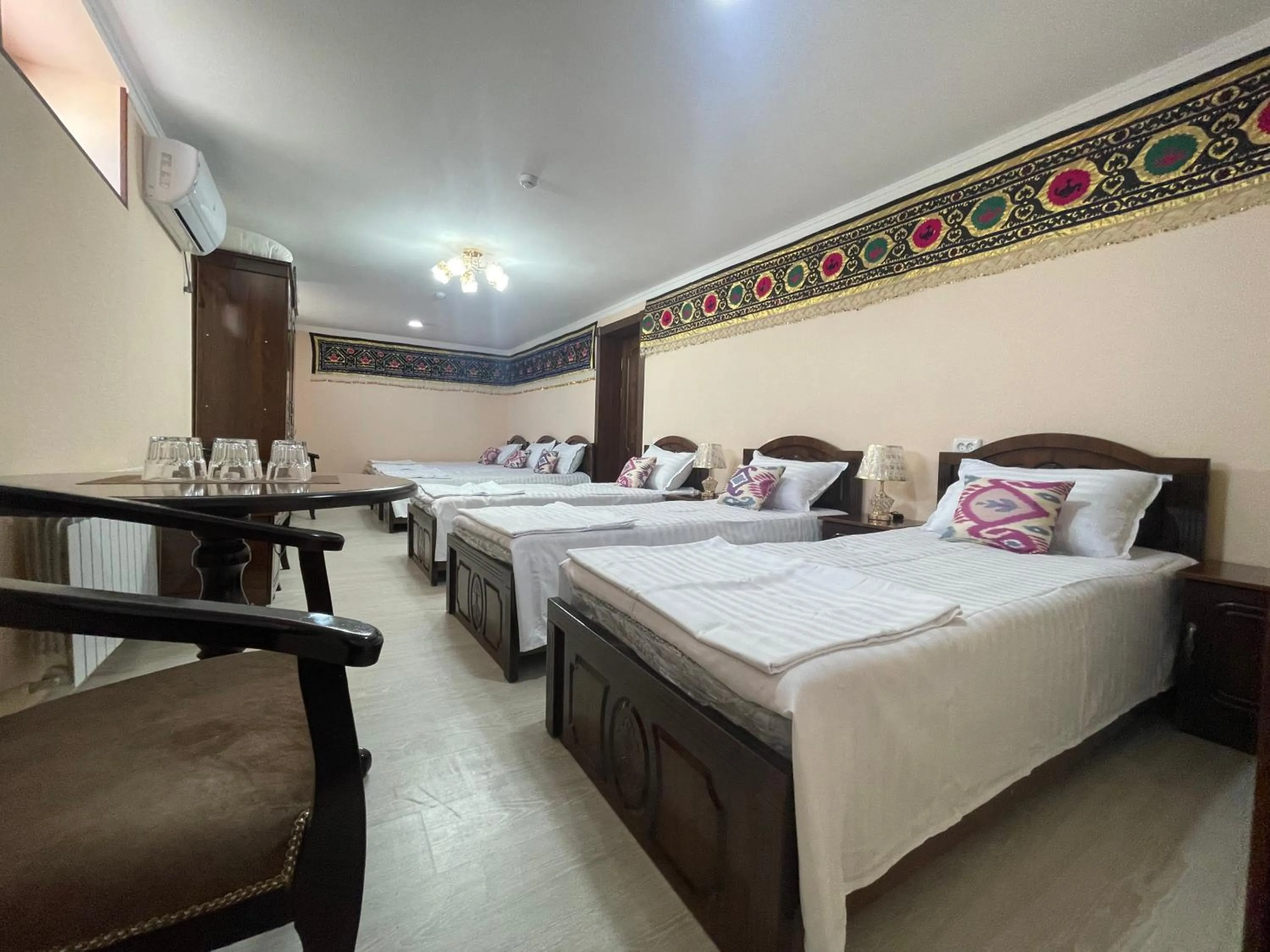 Bed in Hotel Samarkand Ali