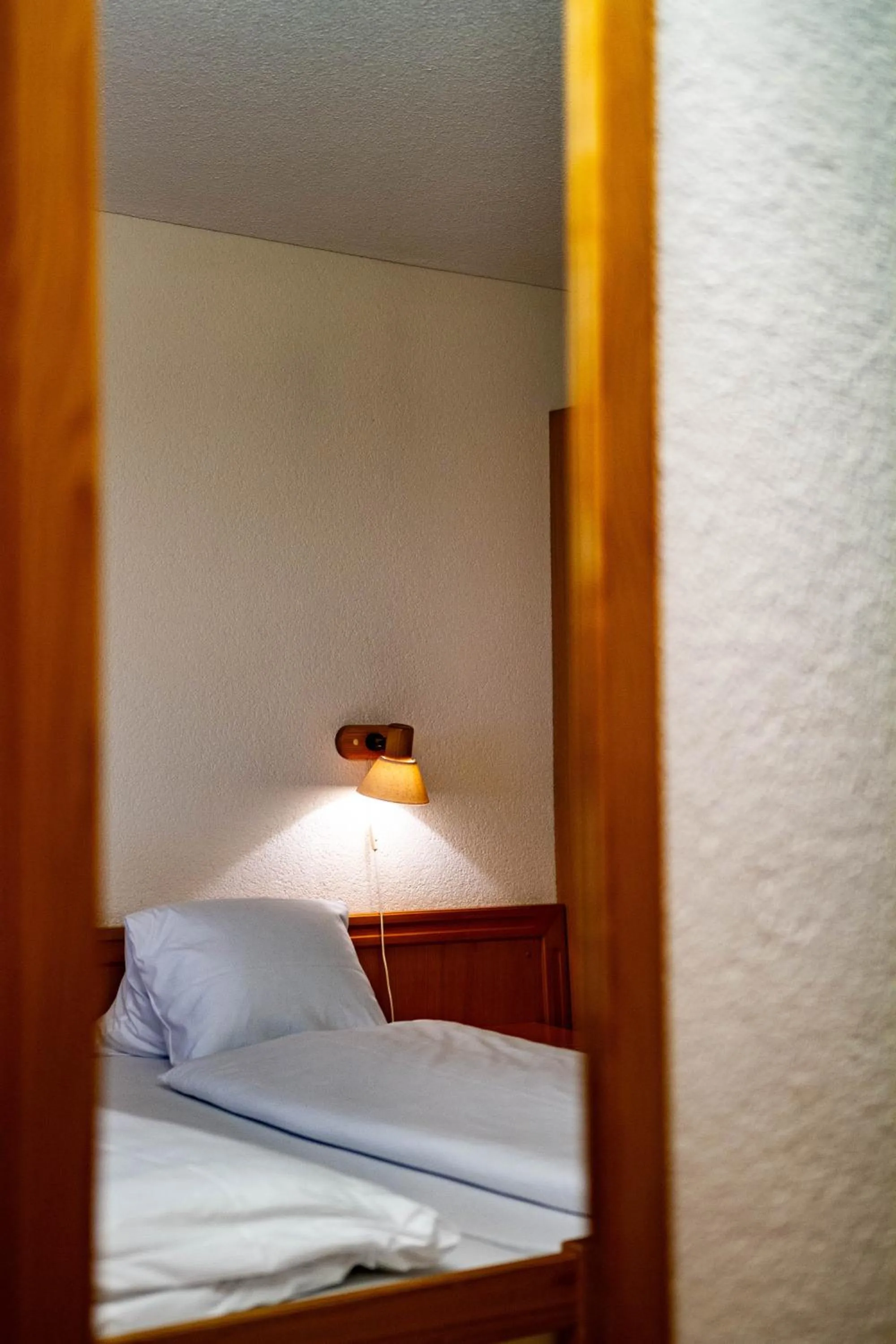 Photo of the whole room, Bed in Kurhaus Heiligkreuz