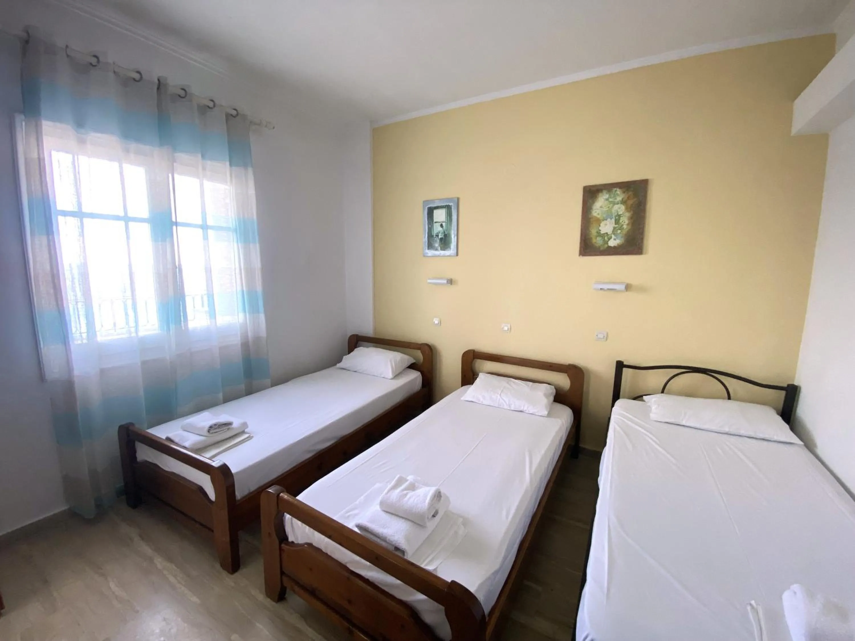 Bedroom in El Greco hotel by Estia