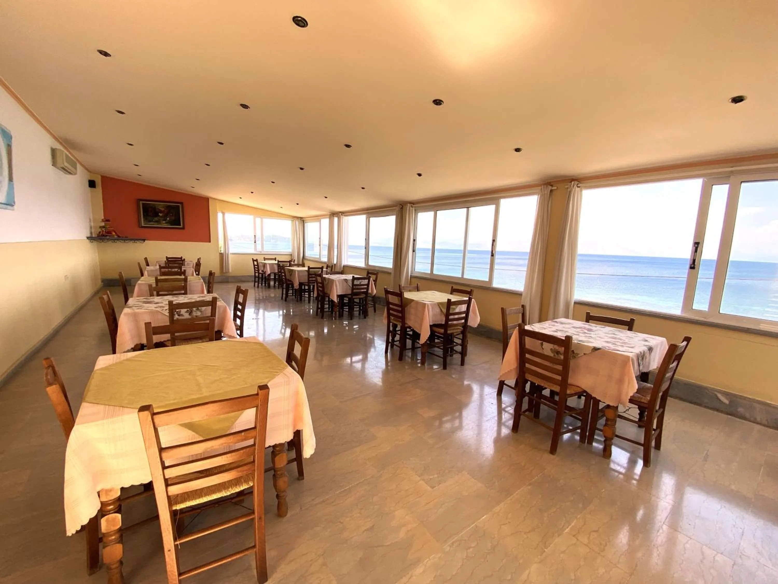Dining area in El Greco hotel by Estia