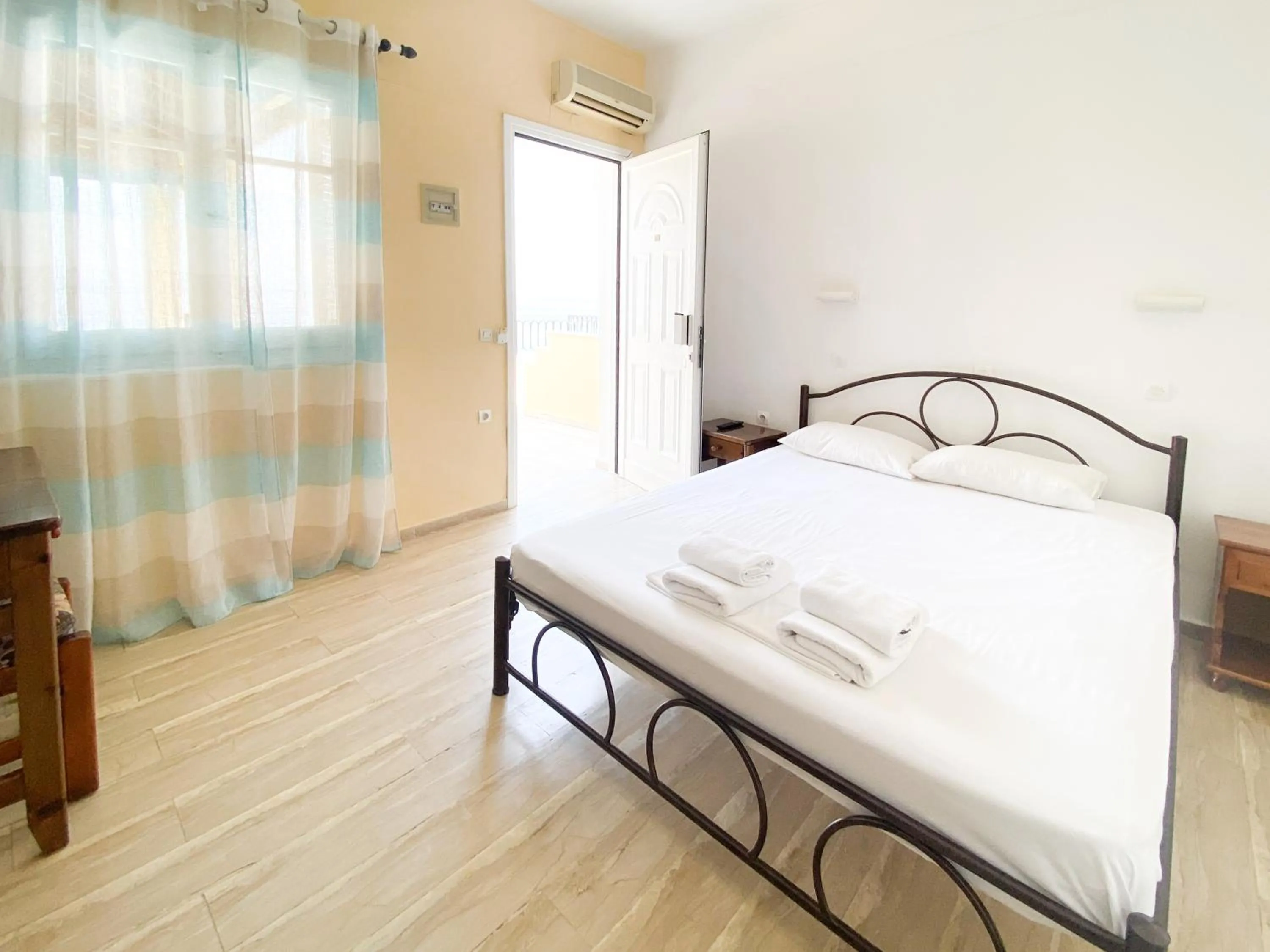 Bedroom in El Greco hotel by Estia