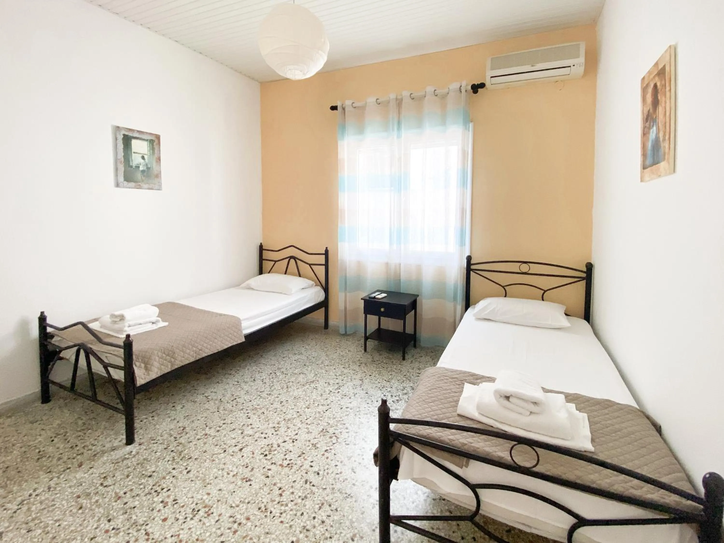 Bedroom in El Greco hotel by Estia