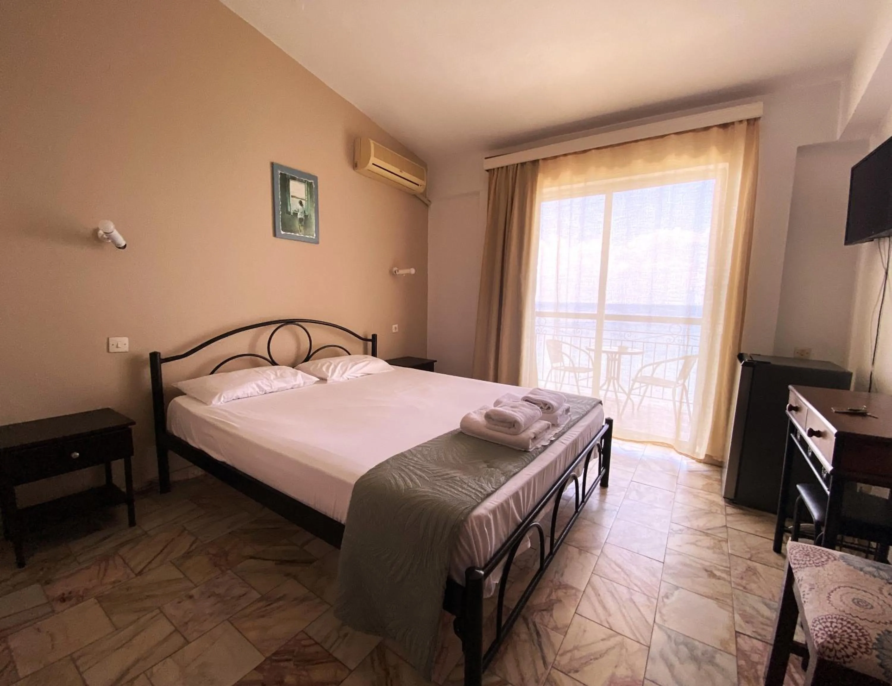 Bedroom in El Greco hotel by Estia