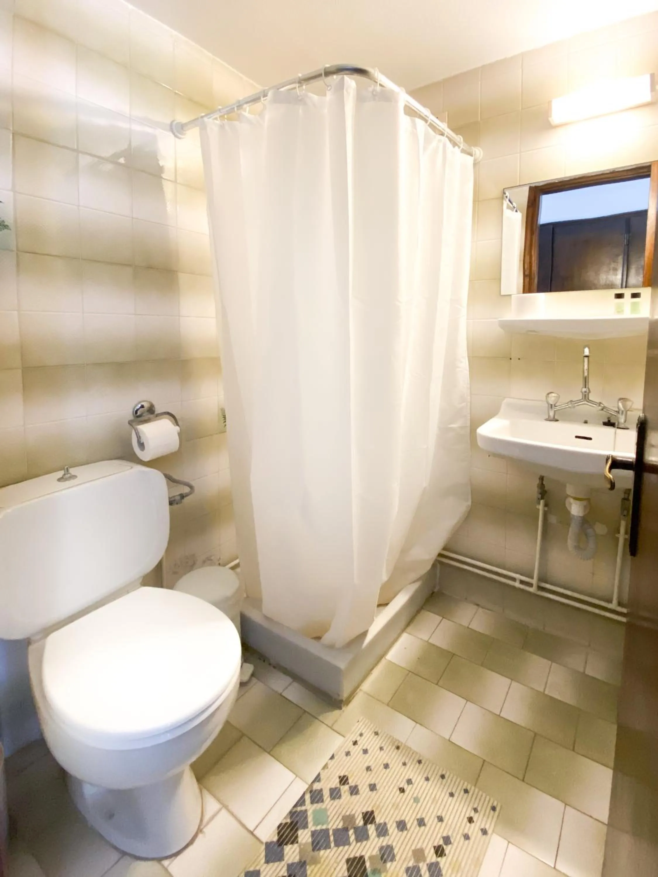 Bathroom in El Greco hotel by Estia