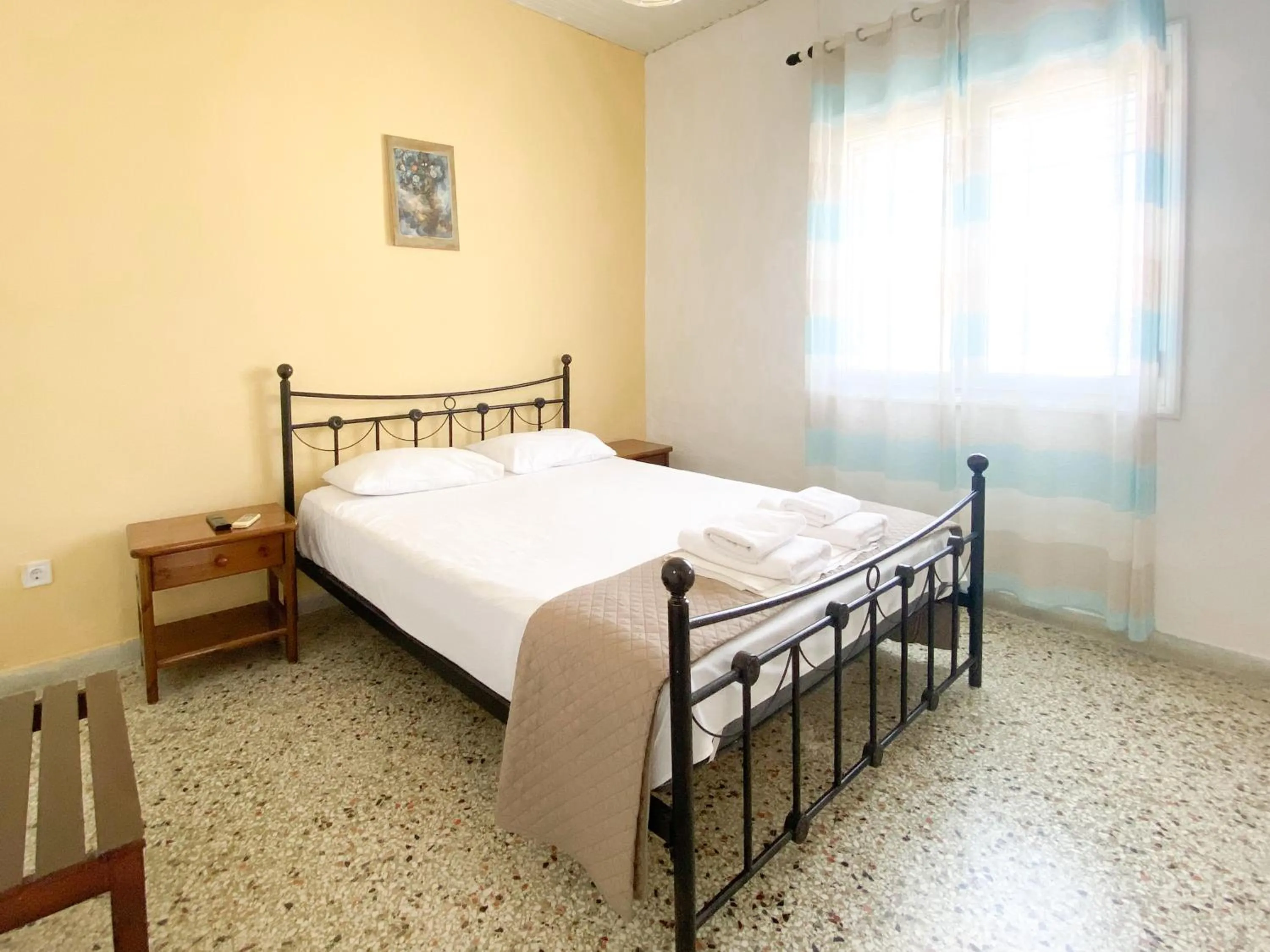 Bedroom in El Greco hotel by Estia