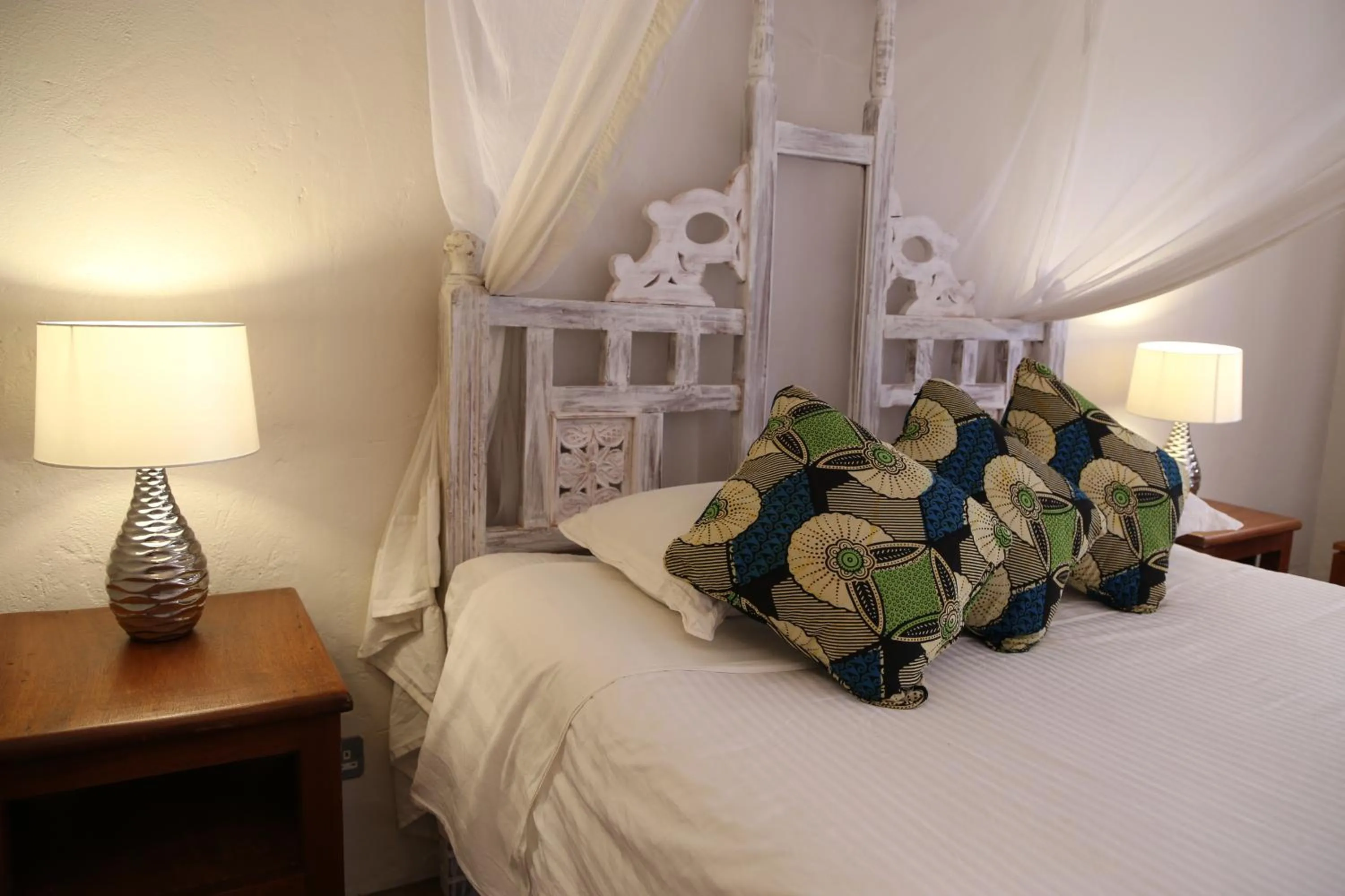 Bed in Wildebeest Eco Camp