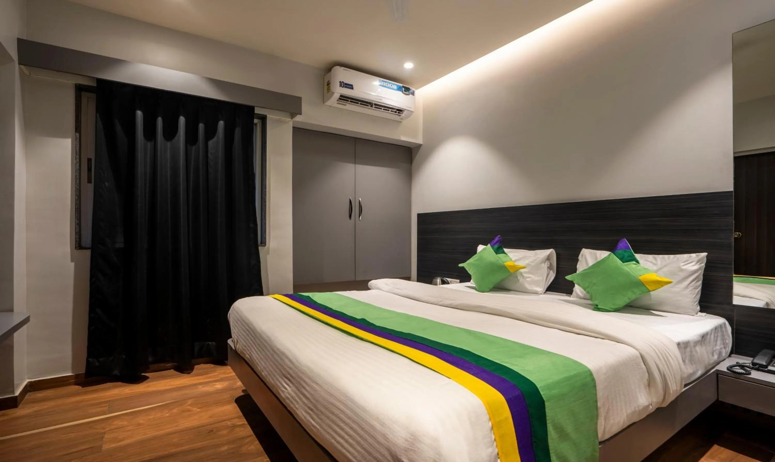 Bed in Treebo Prasha