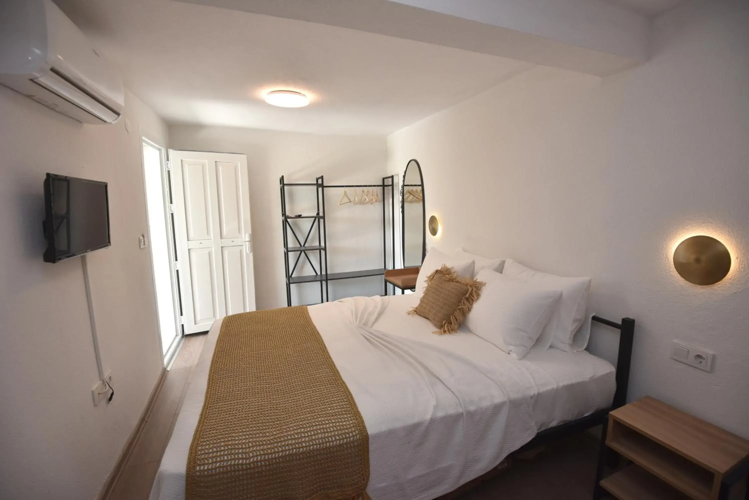 Bed in Benjamin Otel Gumusluk Bed in Benjamin Otel Gumusluk