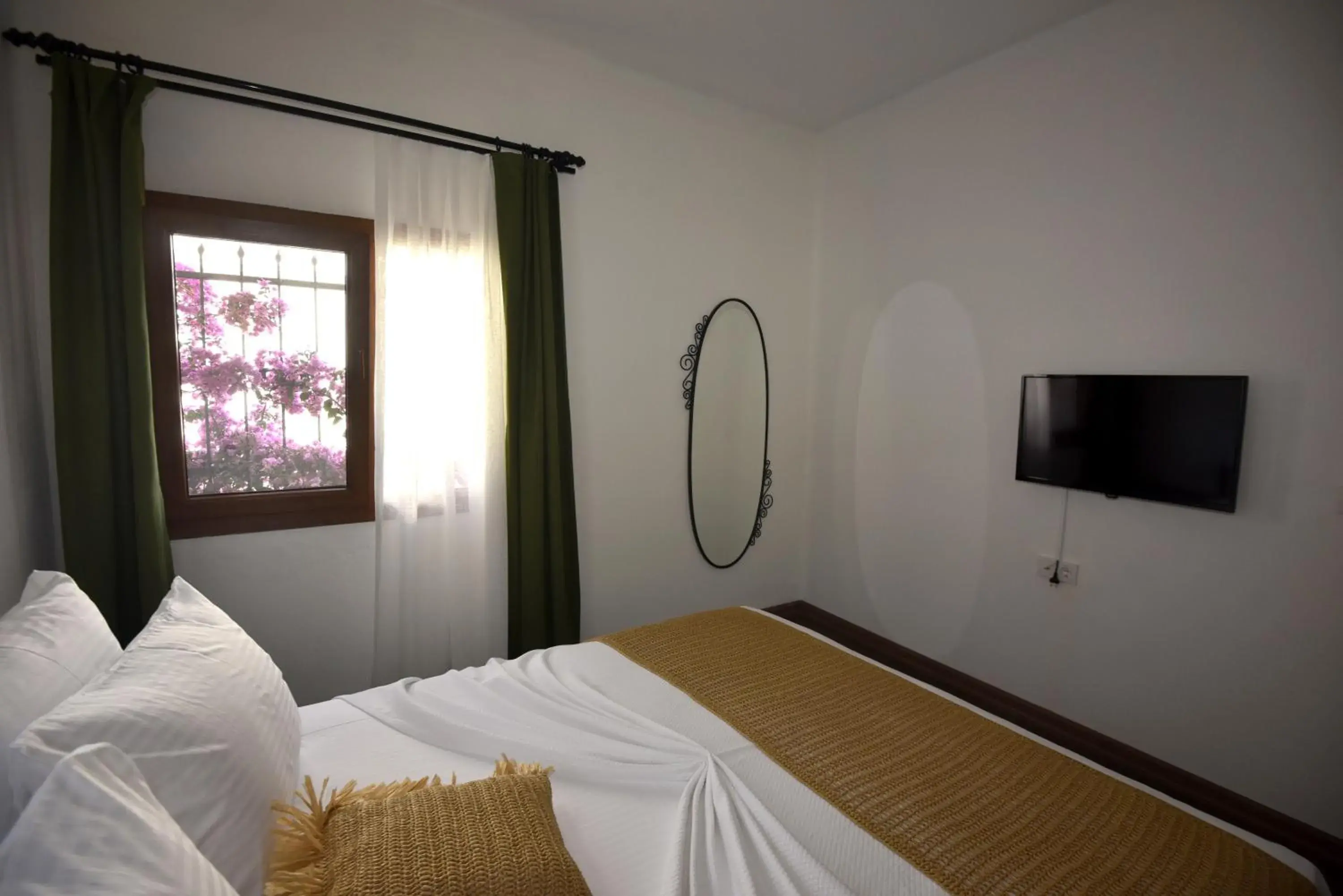 Bed in Benjamin Otel Gumusluk Bed in Benjamin Otel Gumusluk