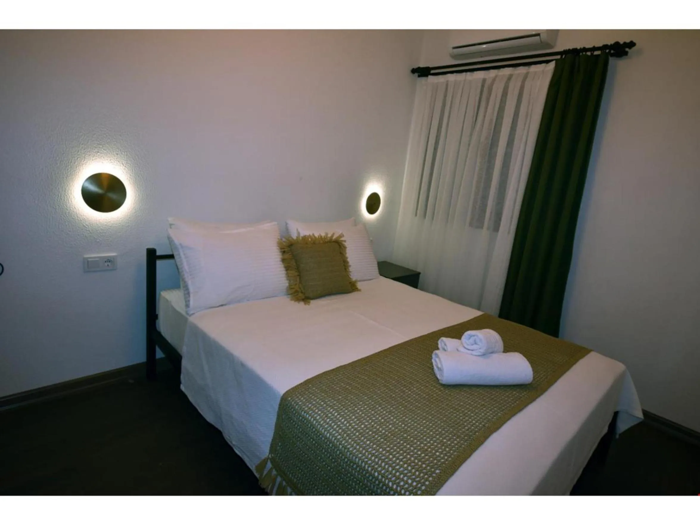 Bed in Benjamin Otel Gumusluk