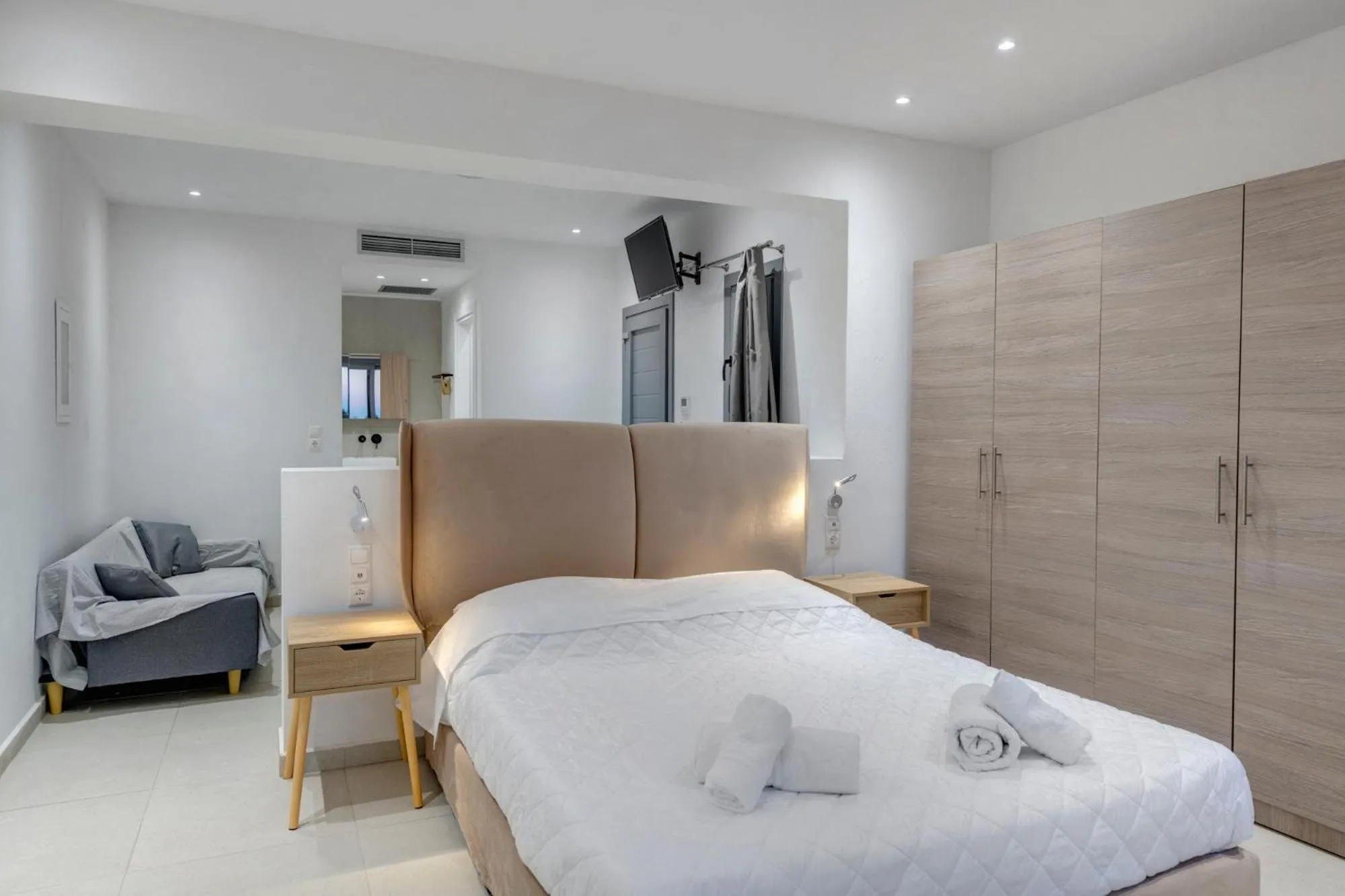 Bedroom, Bed in Chrysonisos Suites with Sunset & Seaviews near Kini