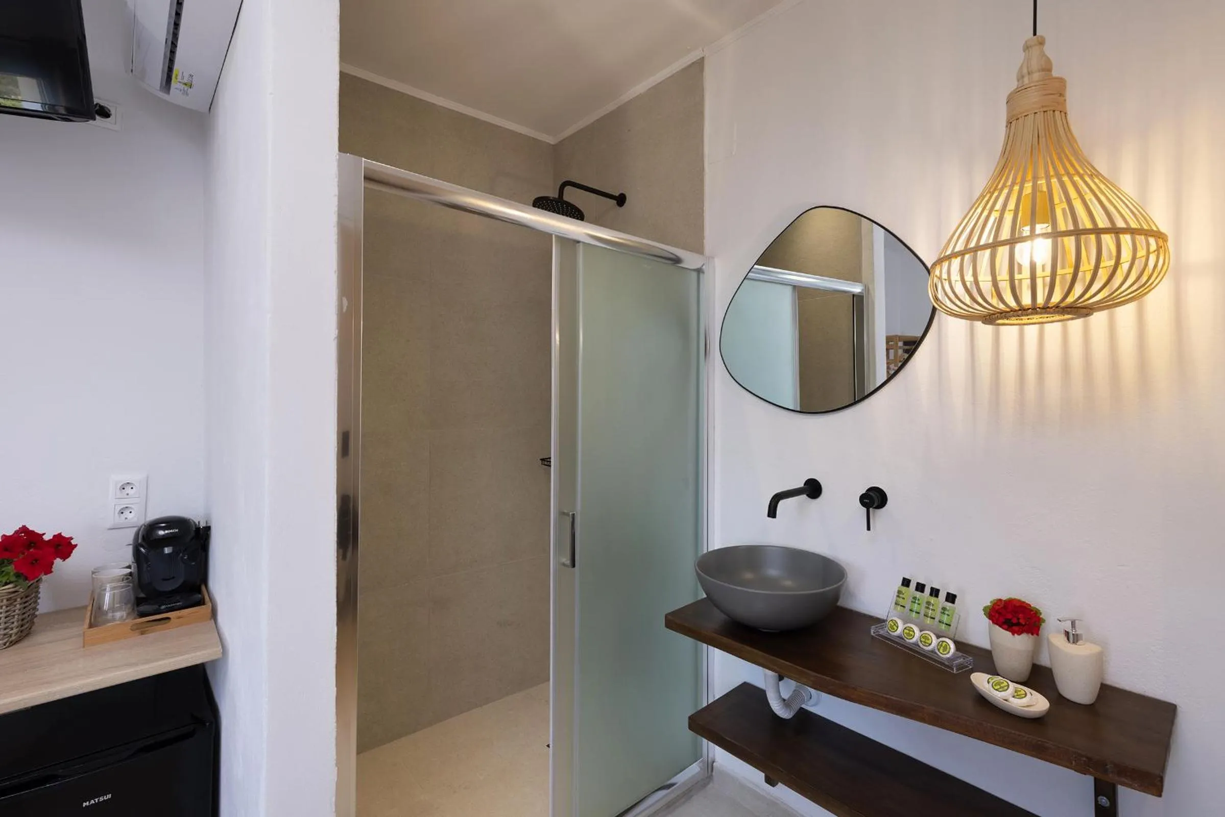 Bathroom in Chrysonisos Suites with Sunset & Seaviews near Kini
