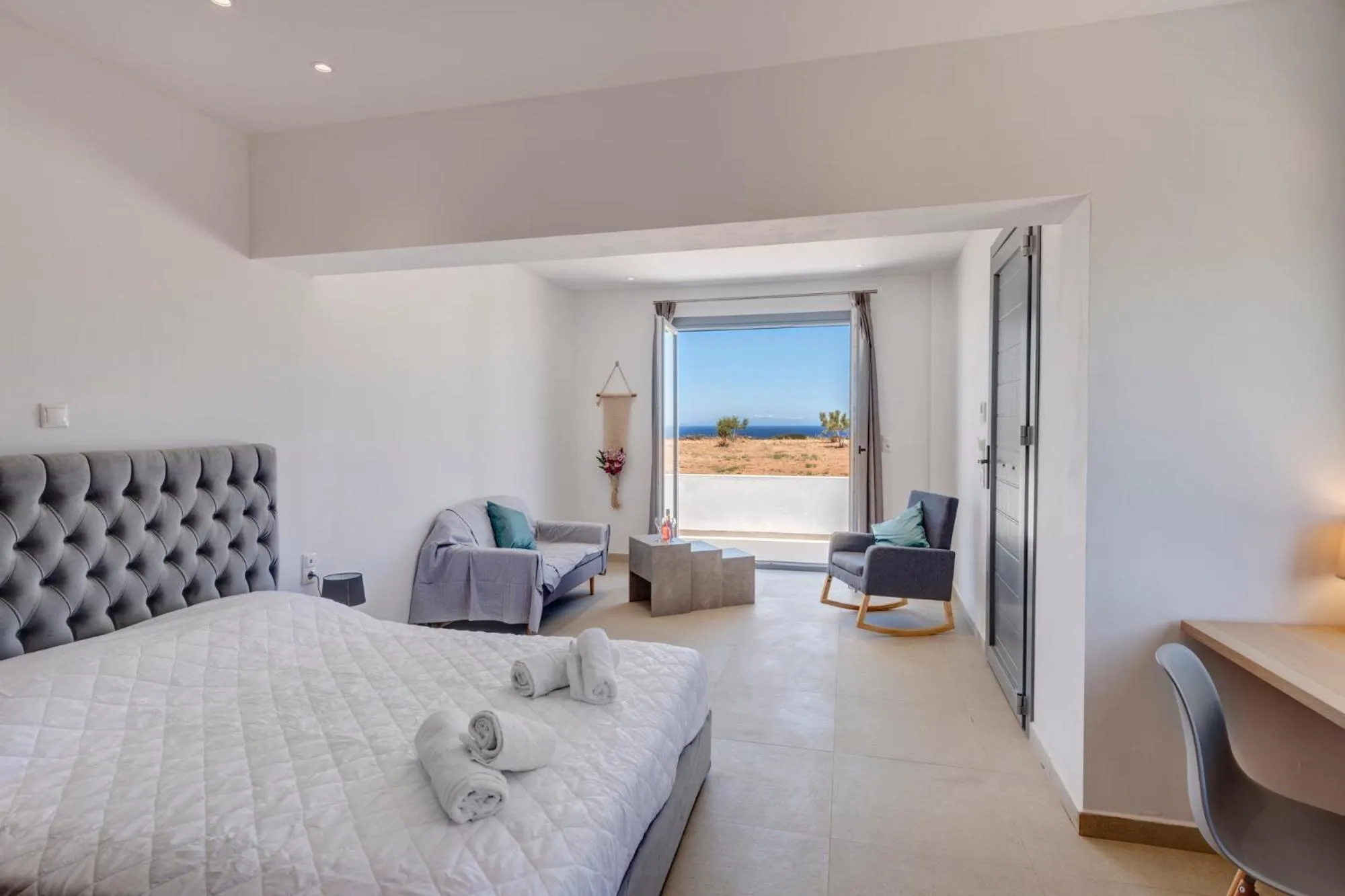 Bedroom, Bed in Chrysonisos Suites with Sunset & Seaviews near Kini