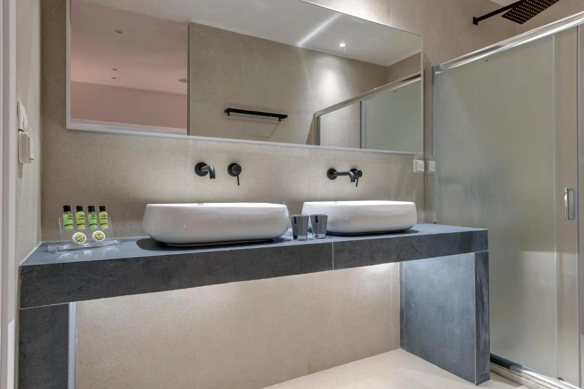 Bathroom in Chrysonisos Suites with Sunset & Seaviews near Kini