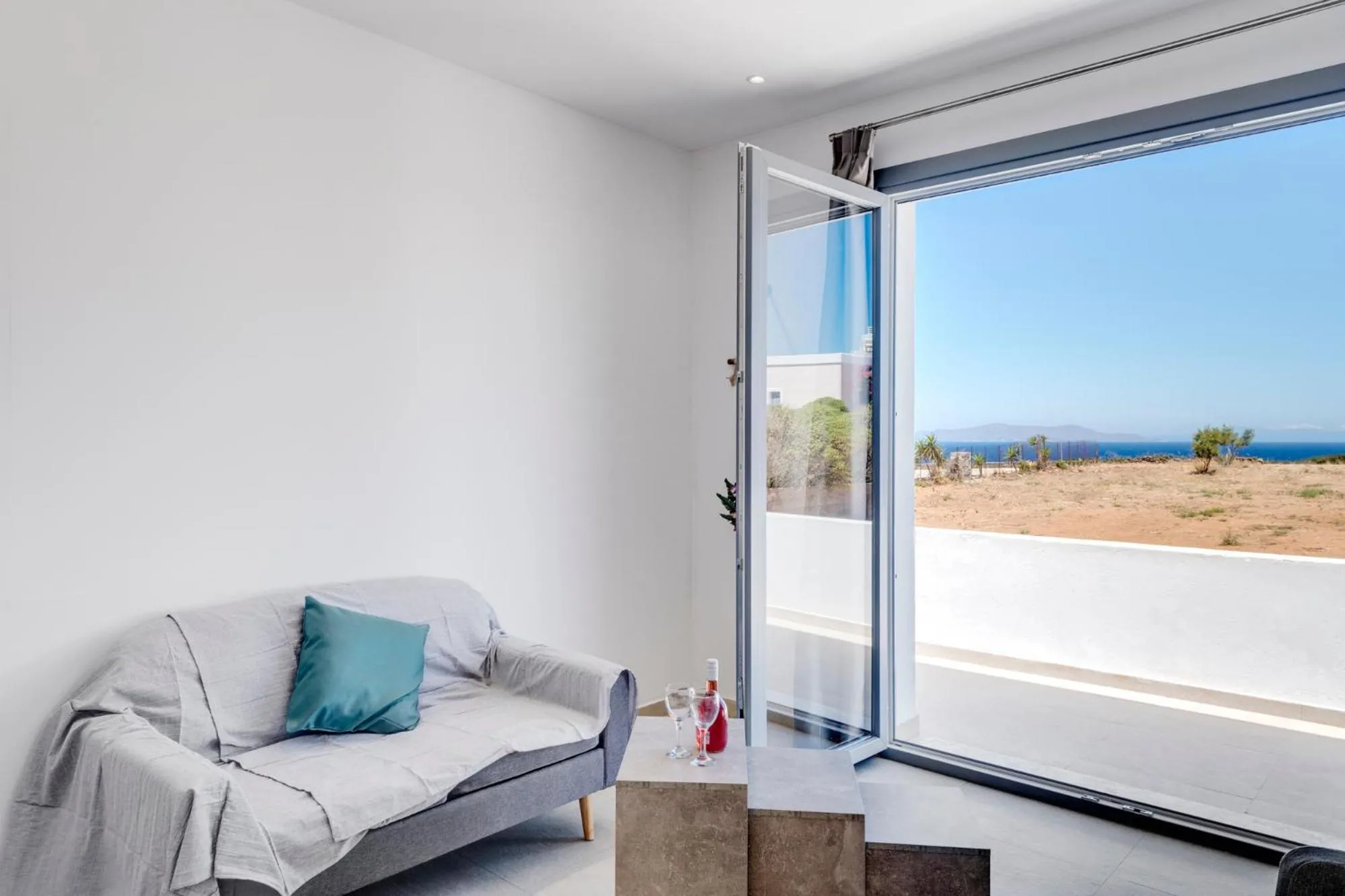 Photo of the whole room in Chrysonisos Suites with Sunset & Seaviews near Kini