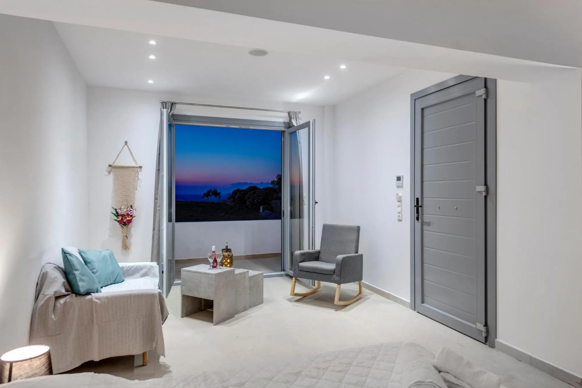 Seating area in Chrysonisos Suites with Sunset & Seaviews near Kini