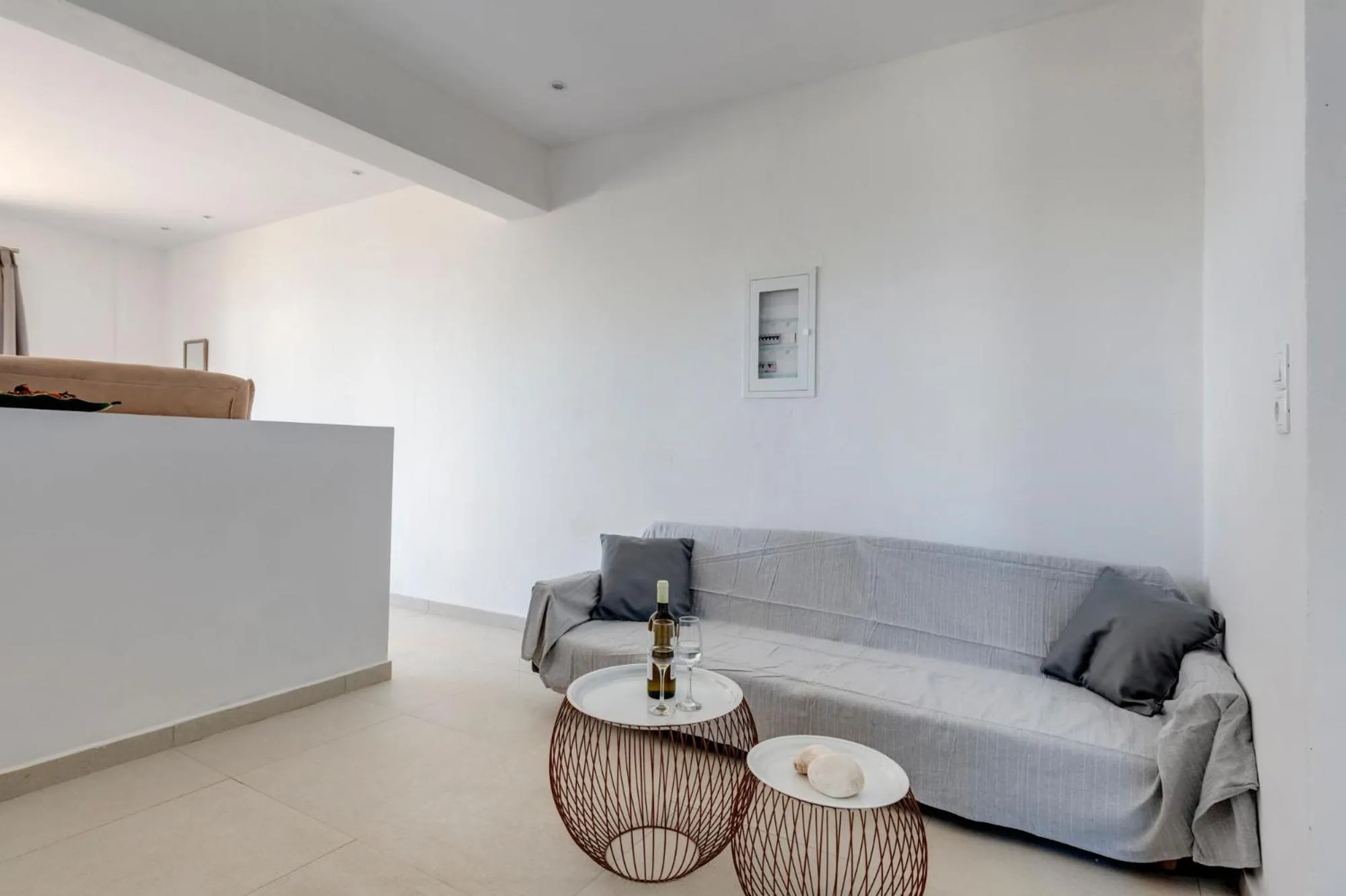 Living room in Chrysonisos Suites with Sunset & Seaviews near Kini