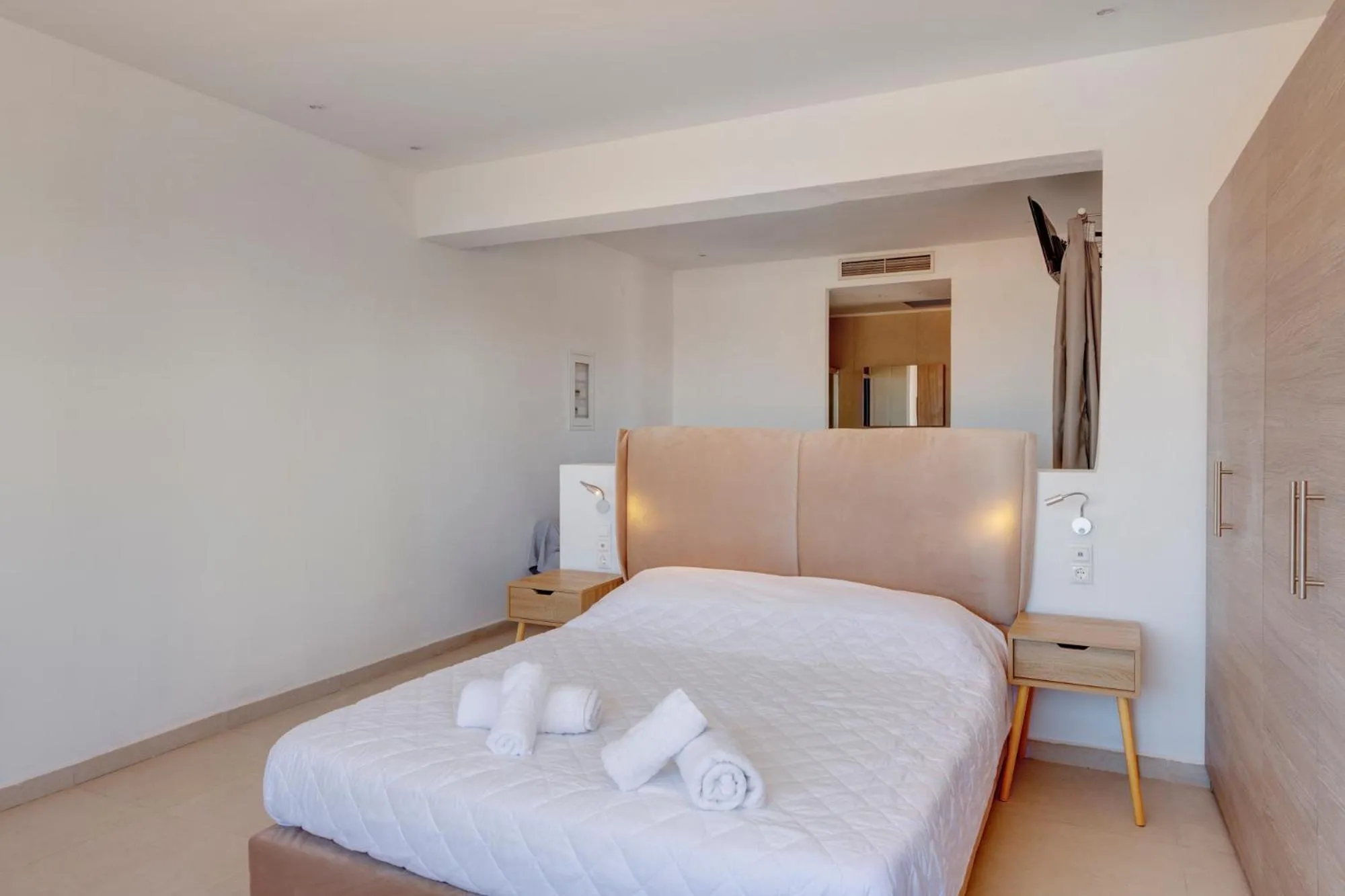 Photo of the whole room, Bed in Chrysonisos Suites with Sunset & Seaviews near Kini