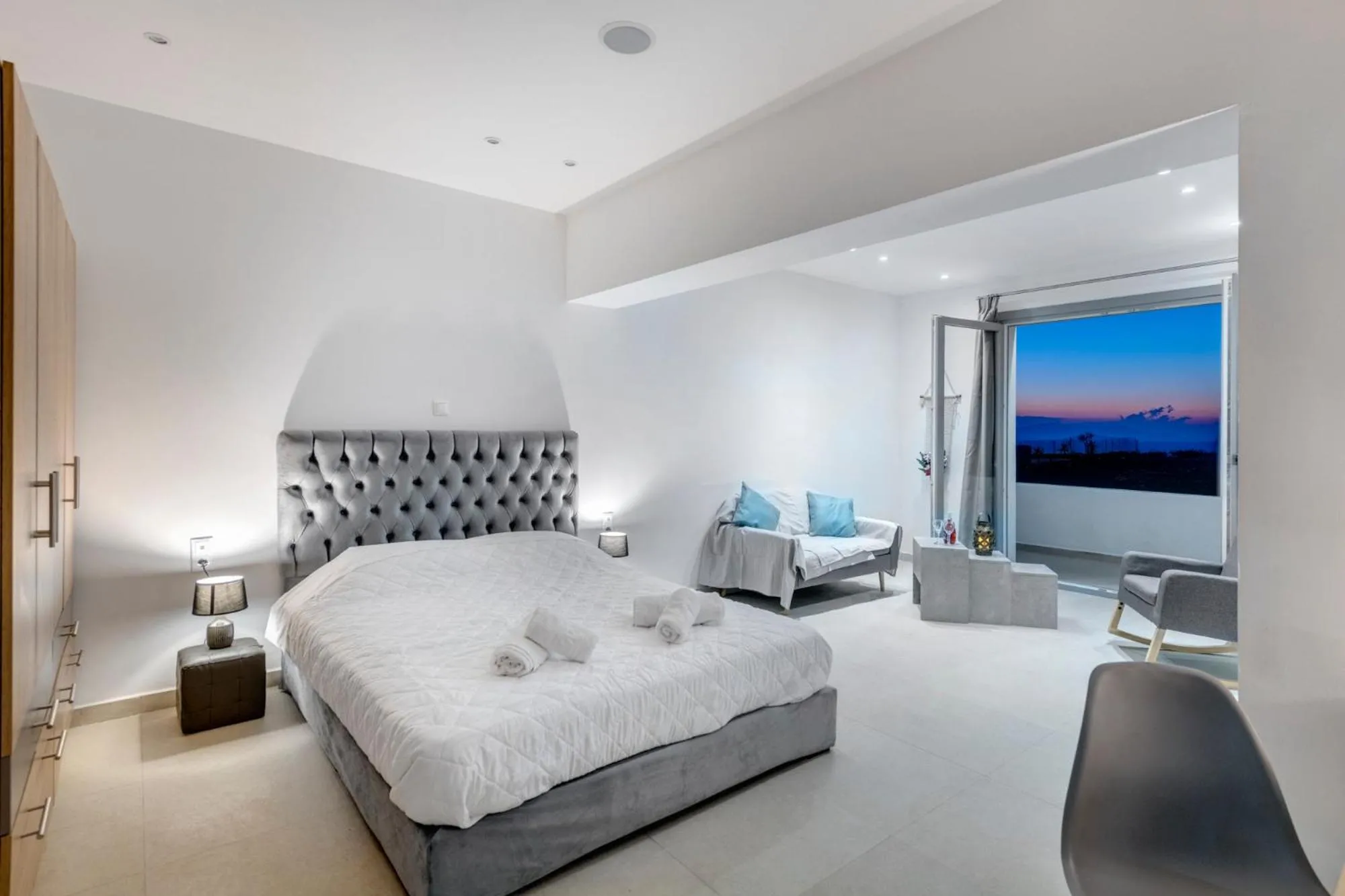 Photo of the whole room, Bed in Chrysonisos Suites with Sunset & Seaviews near Kini
