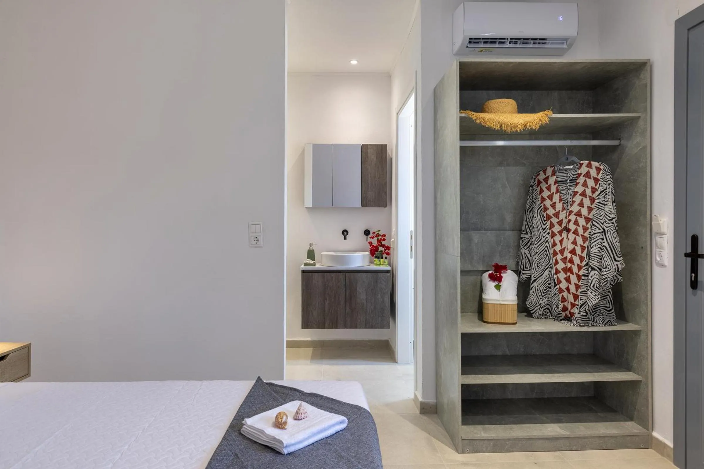 Bed in Chrysonisos Suites with Sunset & Seaviews near Kini