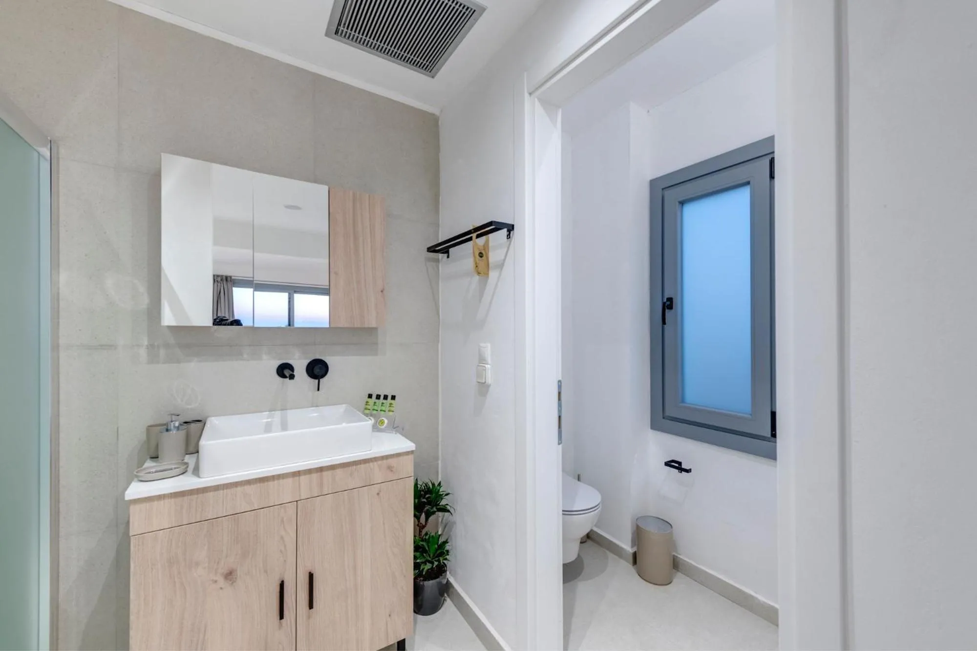 Bathroom in Chrysonisos Suites with Sunset & Seaviews near Kini