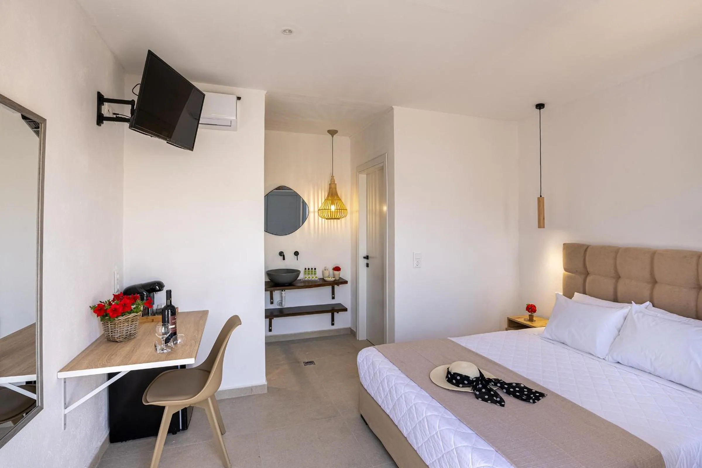 Bedroom, Bed in Chrysonisos Suites with Sunset & Seaviews near Kini