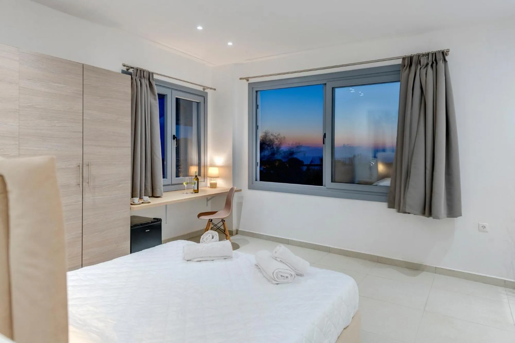 Bedroom, Bed in Chrysonisos Suites with Sunset & Seaviews near Kini