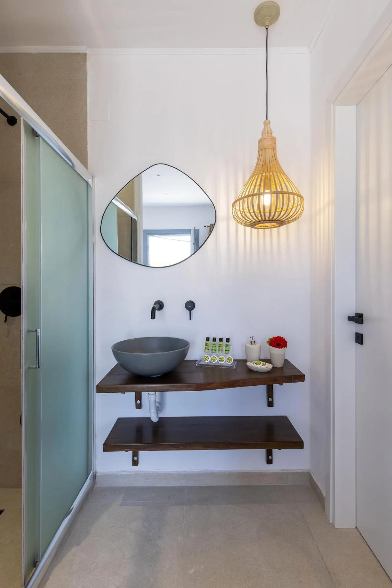 Bathroom in Chrysonisos Suites with Sunset & Seaviews near Kini