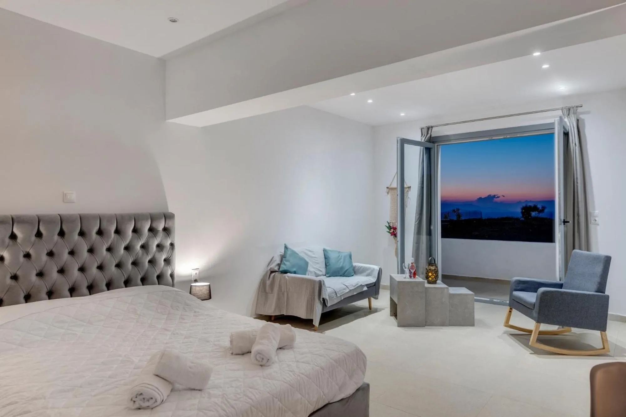 Photo of the whole room, Bed in Chrysonisos Suites with Sunset & Seaviews near Kini