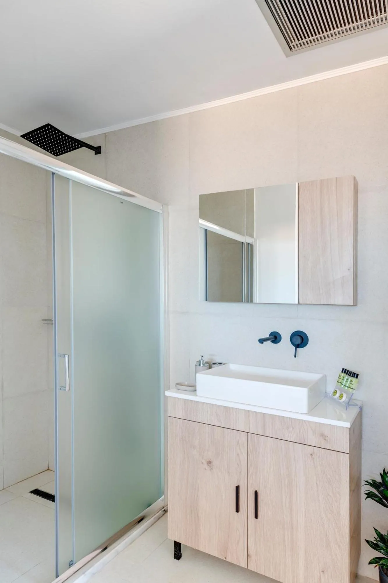 Bathroom in Chrysonisos Suites with Sunset & Seaviews near Kini