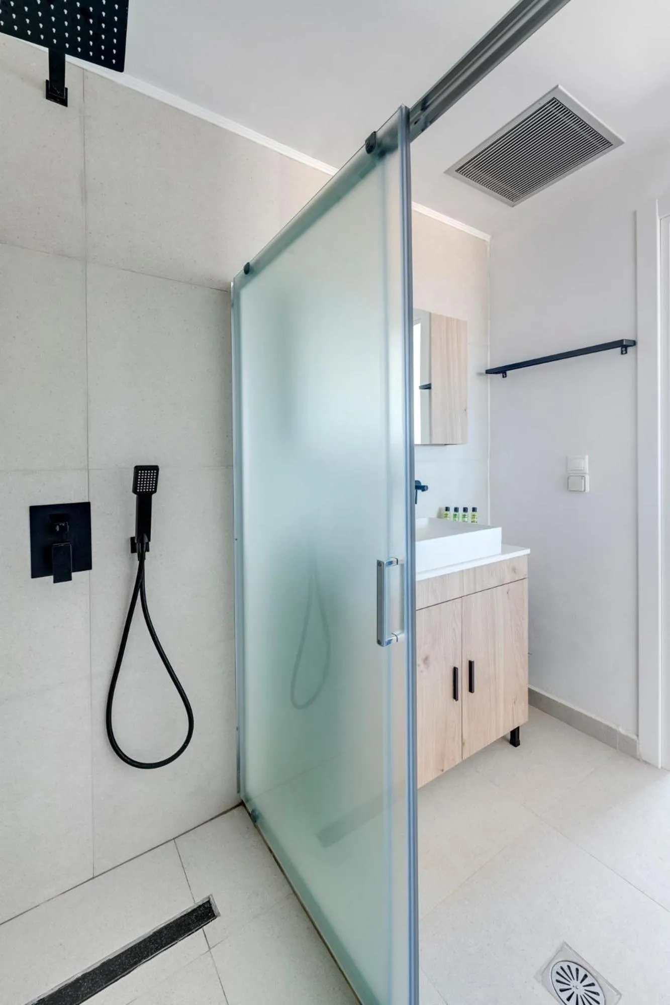 Bathroom in Chrysonisos Suites with Sunset & Seaviews near Kini