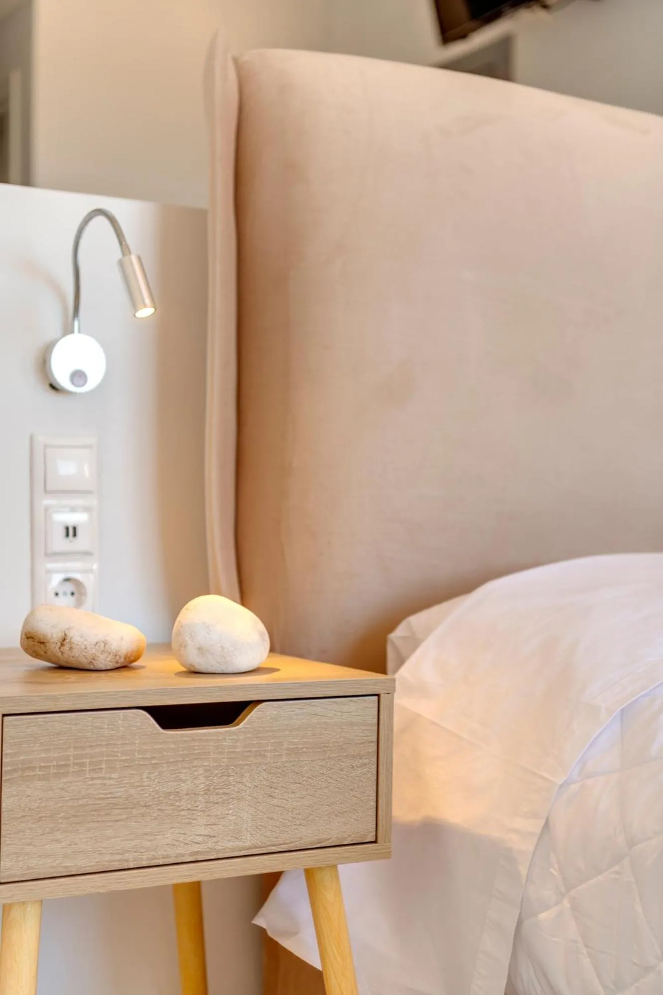 Bed in Chrysonisos Suites with Sunset & Seaviews near Kini