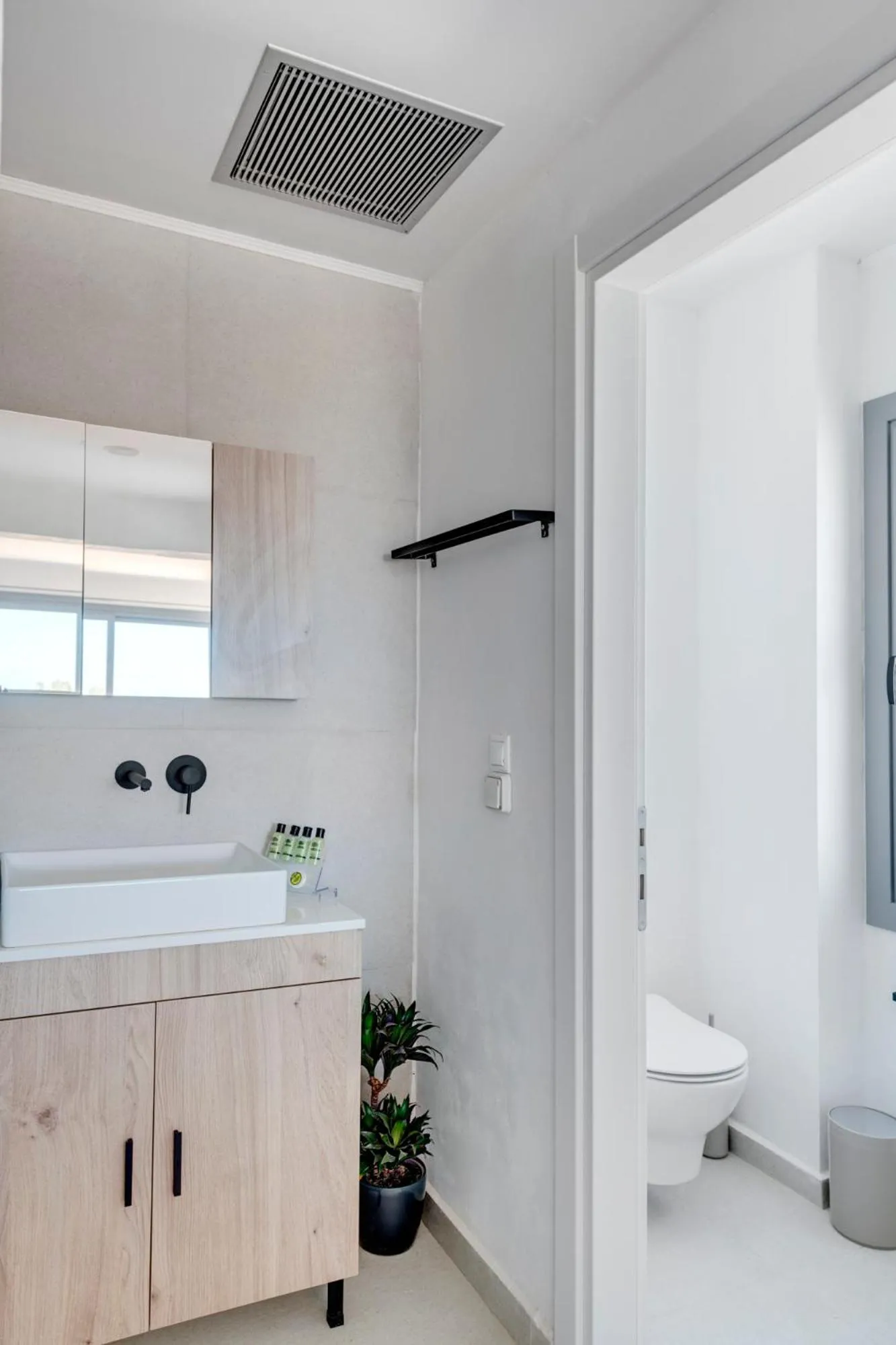 Bathroom in Chrysonisos Suites with Sunset & Seaviews near Kini