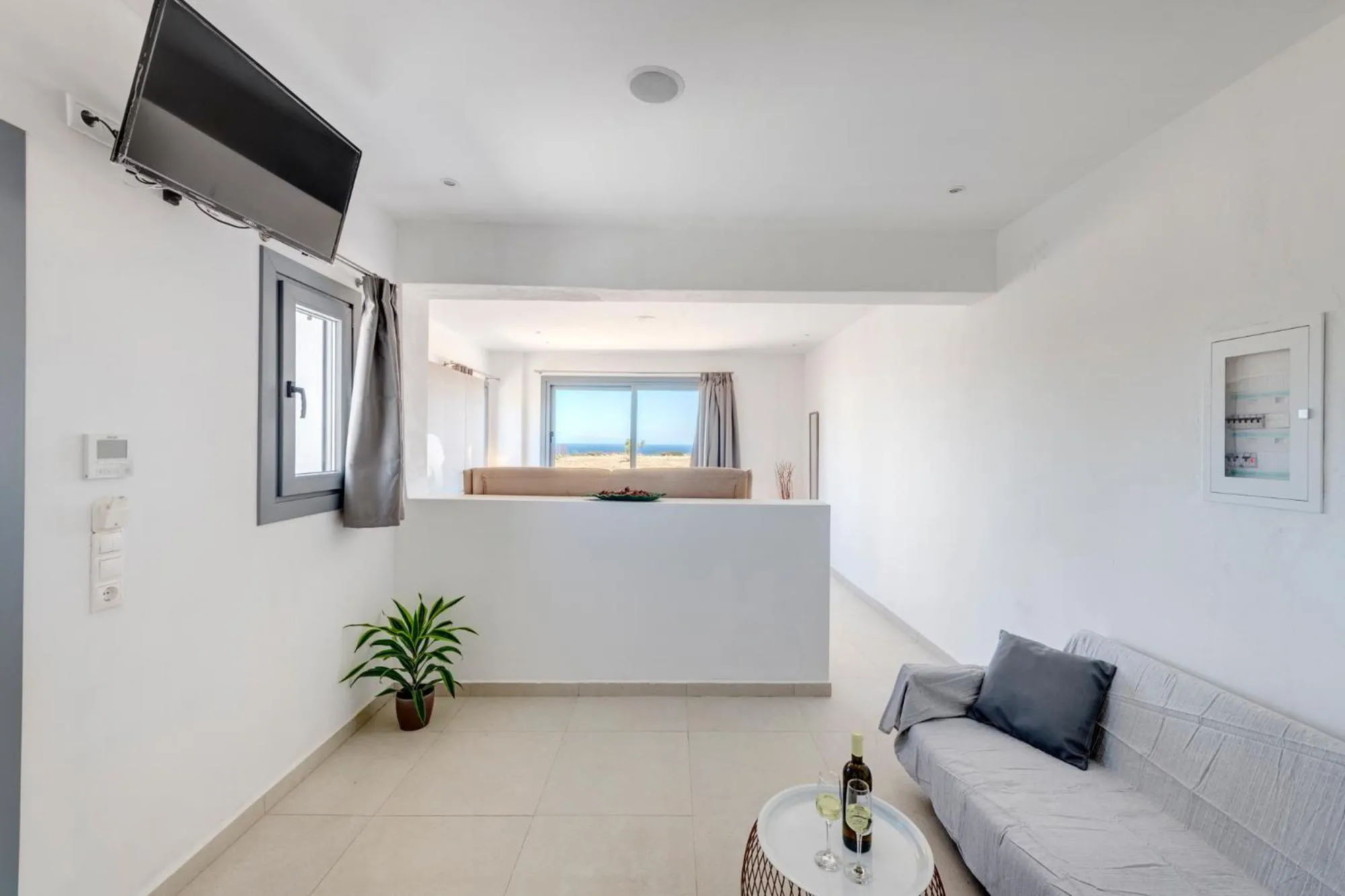 Seating area in Chrysonisos Suites with Sunset & Seaviews near Kini