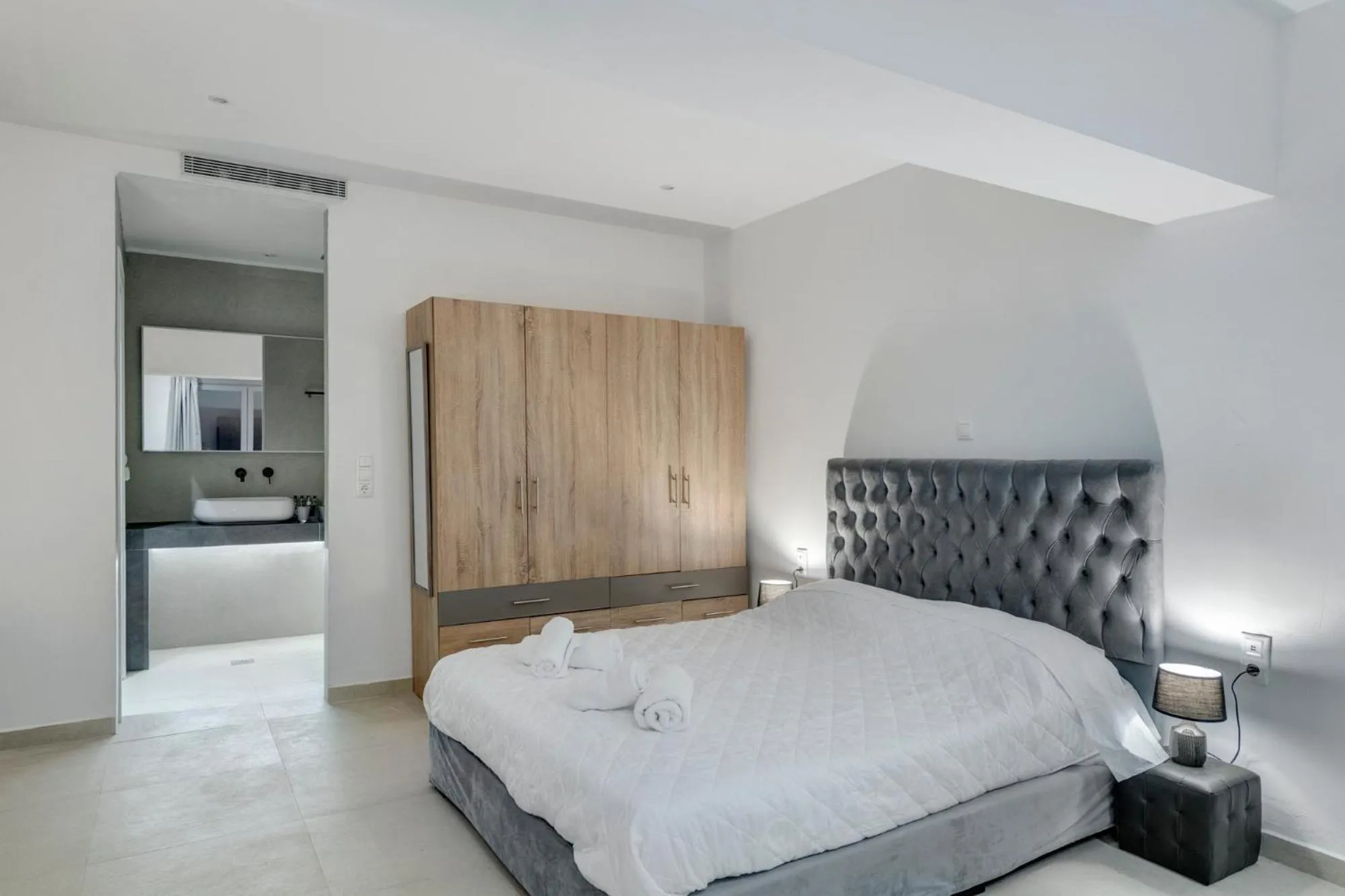 Bedroom, Bed in Chrysonisos Suites with Sunset & Seaviews near Kini