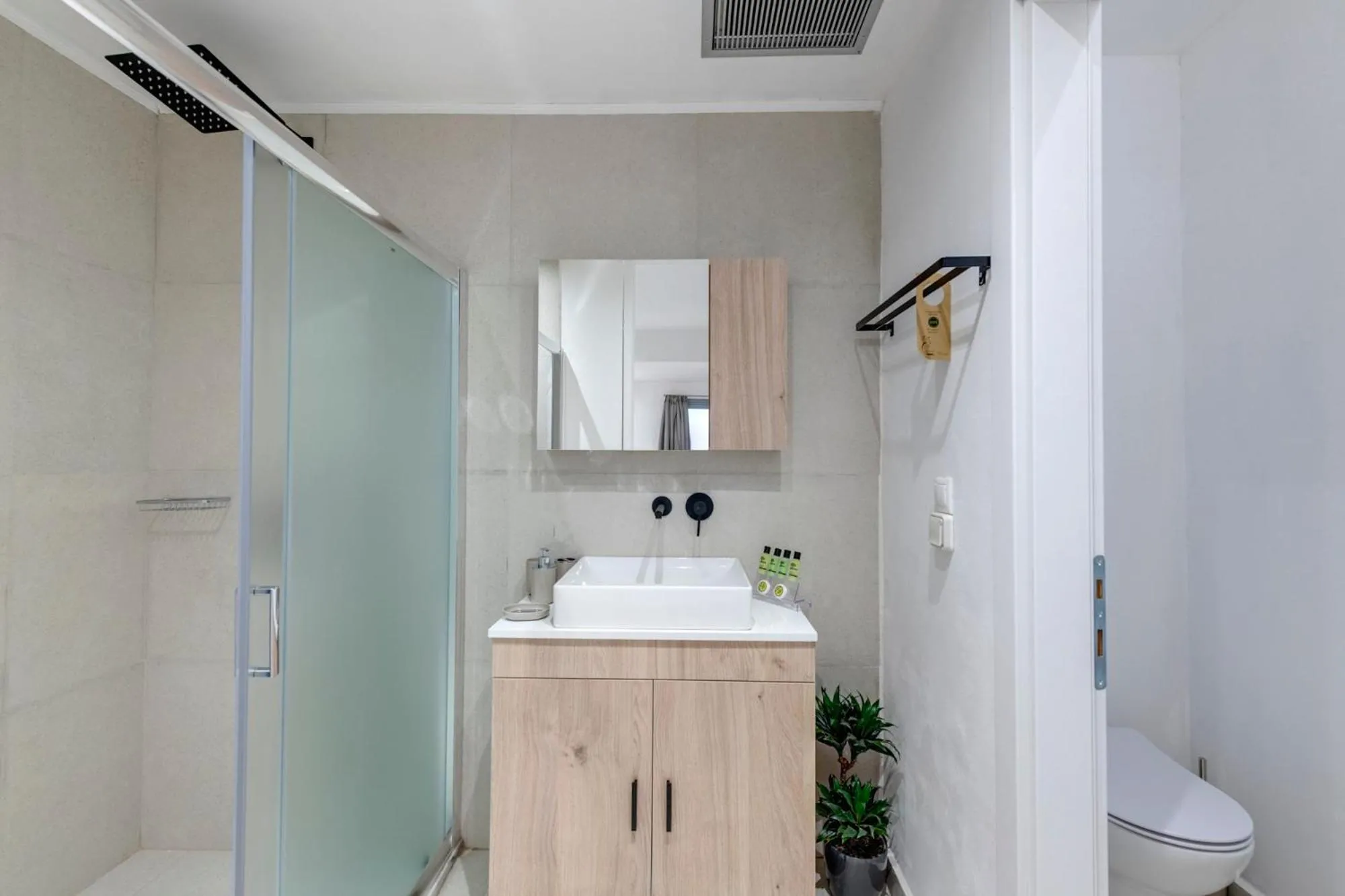 Shower in Chrysonisos Suites with Sunset & Seaviews near Kini