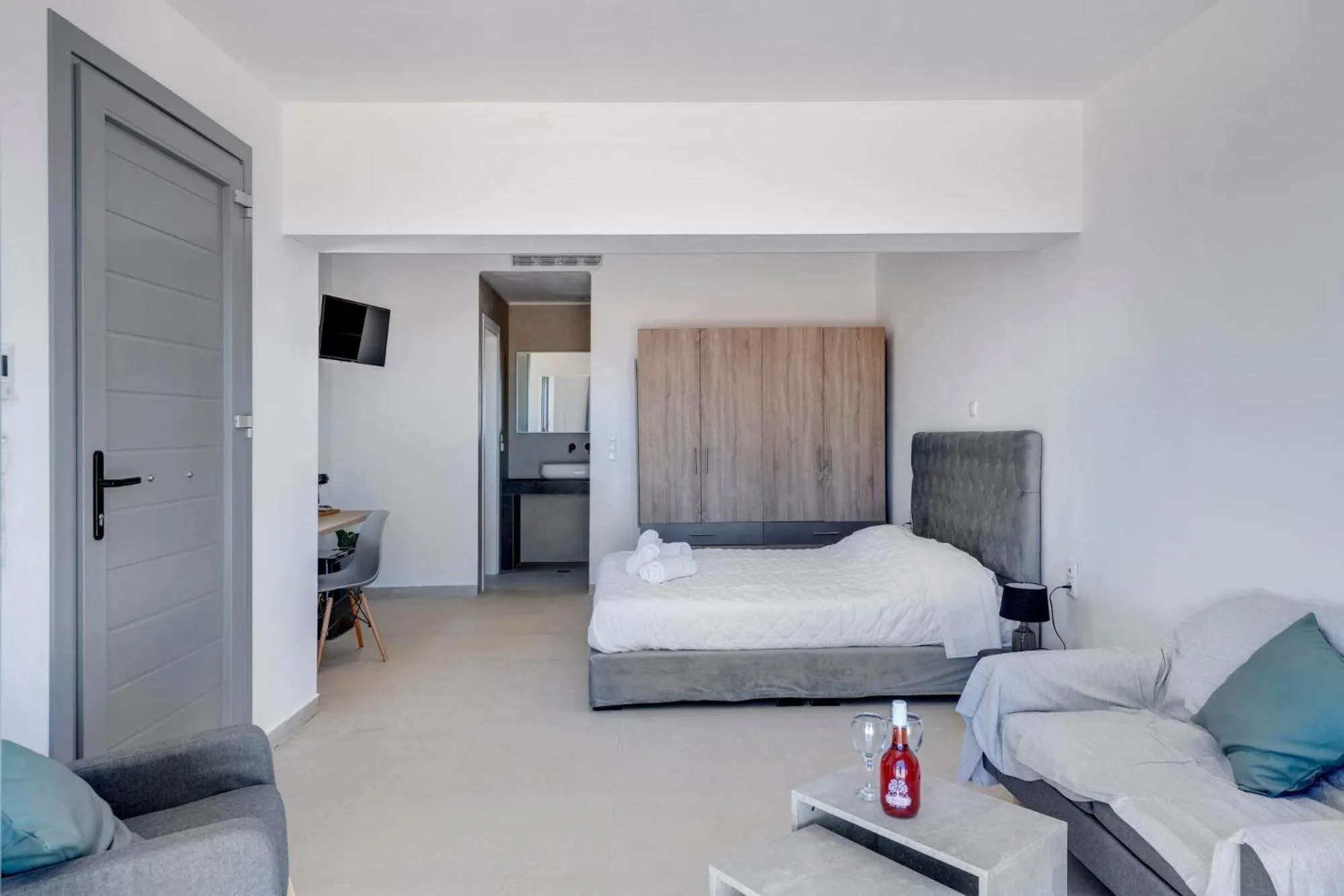 Bedroom, Bed in Chrysonisos Suites with Sunset & Seaviews near Kini