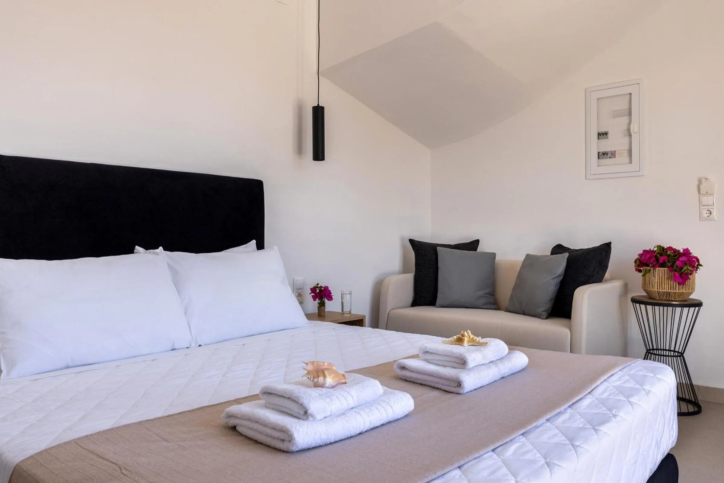 Bedroom, Bed in Chrysonisos Suites with Sunset & Seaviews near Kini